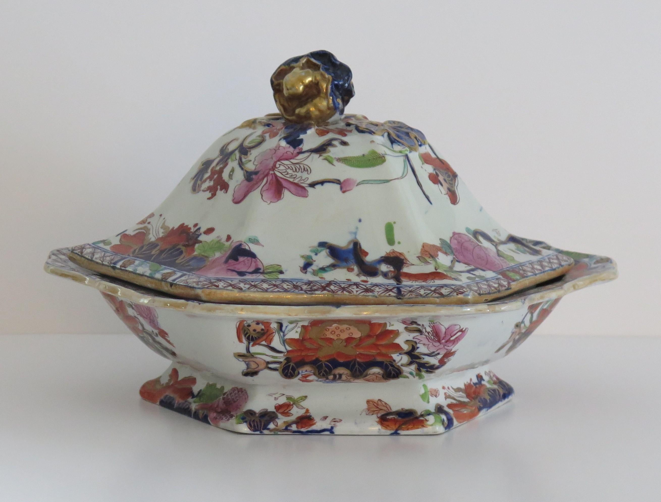 This is a superb large Ironstone Vegetable Tureen, complete with cover or lid , made by Mason's of Lane Delph, Staffordshire, England, during the early part of the 19th century, circa 1820.

This tureen is well potted and is hexagonal in shape with