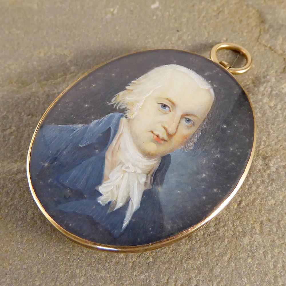 This Georgian Miniature Pendant features a mans portrait on the front with the initials 'JR' on the back. Set in Gold, this piece is a treasured beauty. It also comes with its original antique casing! 

Condition: Very Good, slightest signs of wear