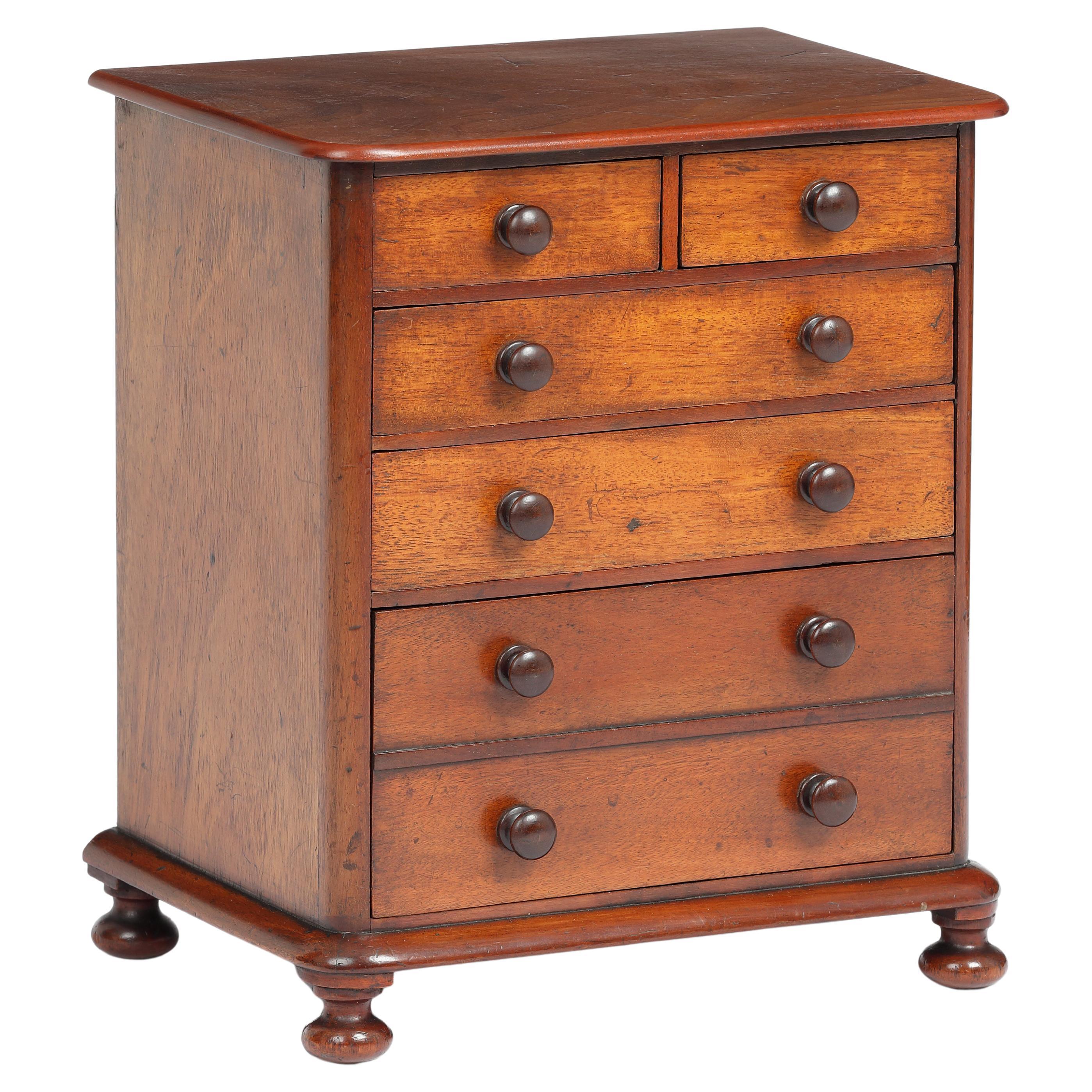 Georgian miniature mahogany chest of drawers For Sale