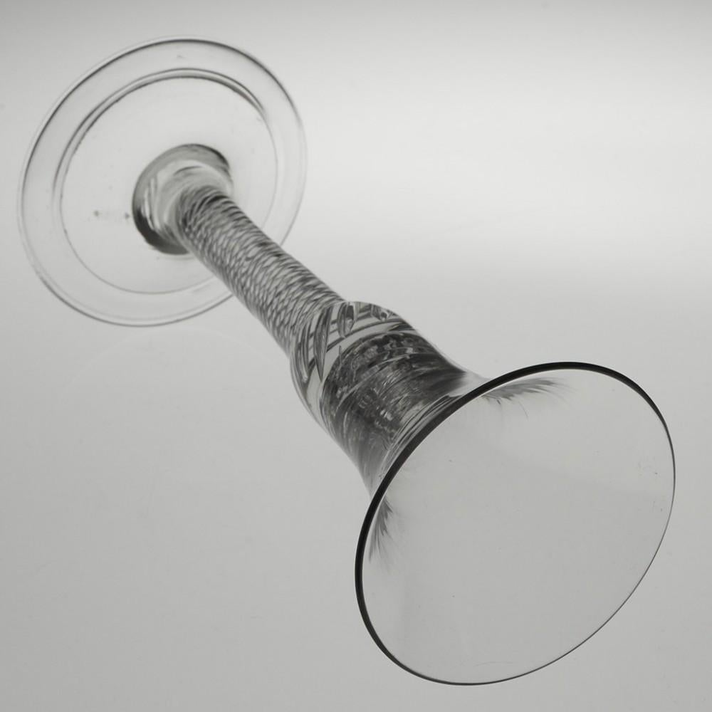 Georgian Multi Spiral Air Twist Wine Glass with Folded Foot, circa 1745

A very fine example of a Georgian 'standard'

Additional information:
Heading : Georgian Multi Spiral Air Twist-Wine Glass With Folded Foot
Period : George II