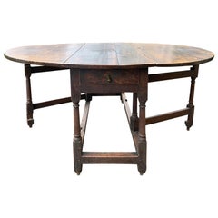Georgian Oak Drop Leaf Oval Table with Drawer, circa 1720