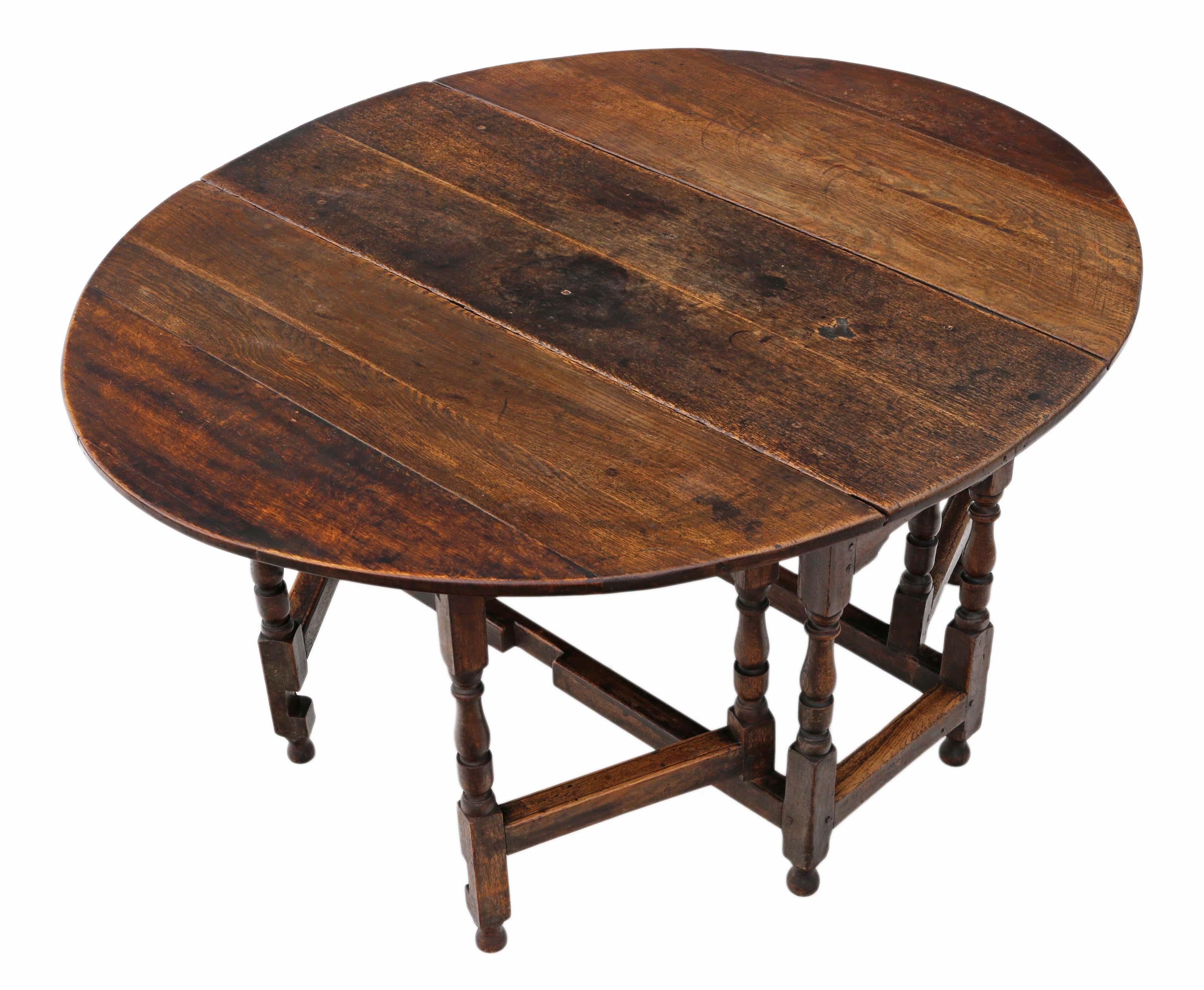 Georgian 18th century oak gate leg drop leaf dining table.
Rare and attractive, with a drawer to both sides (one original, the other a quality later both slide freely).
Solid, strong and has no loose joints. Double gate legs to both sides.
Full