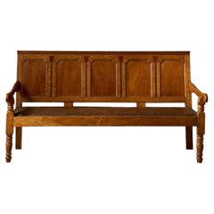 Georgian oak hall bench with tulip decoration