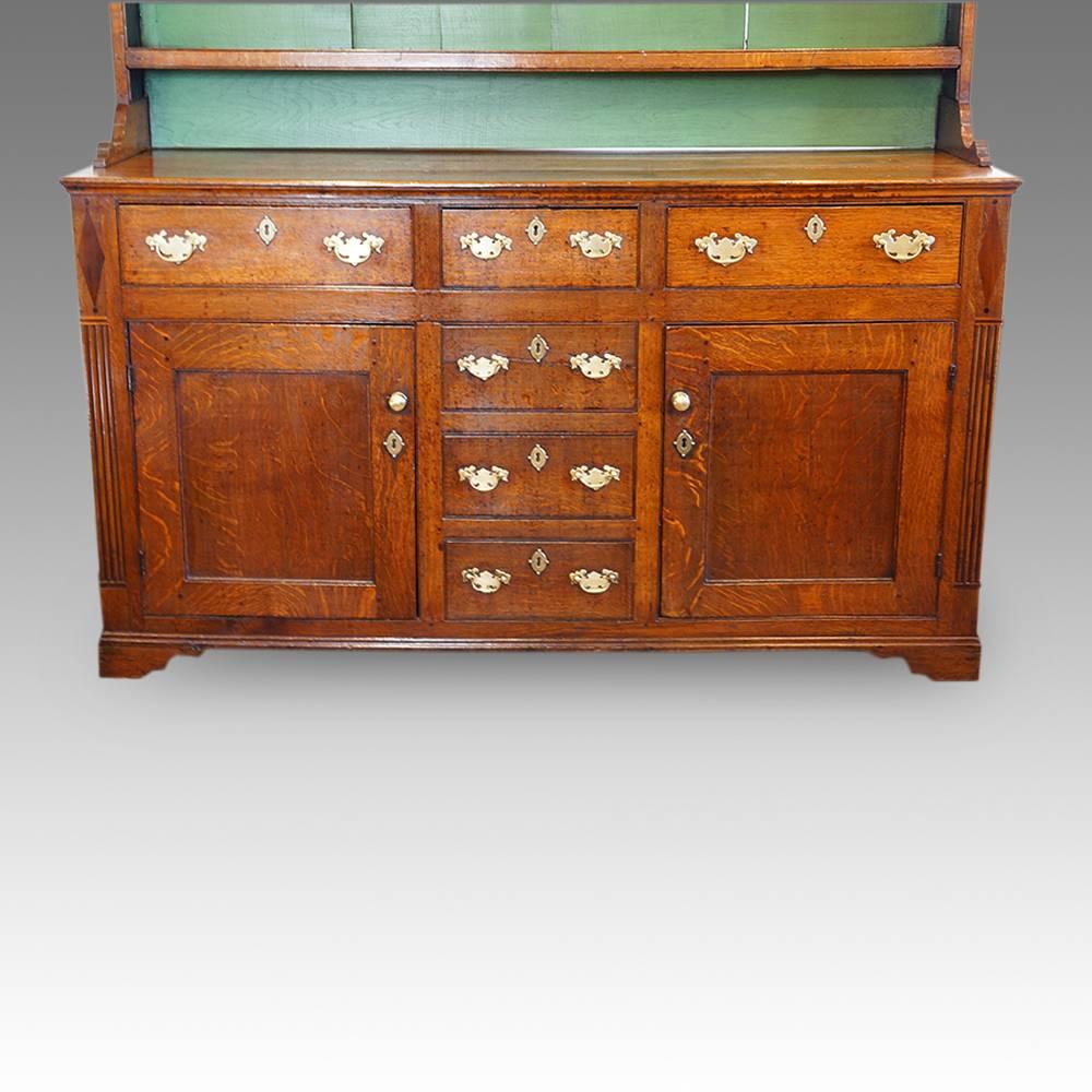 Georgian oak North Country dresser with rack
This Georgian oak North Country dresser with rack would have been first made circa 1820.
The base fitted with three drawers along the top and dummy drawers running down the middle.
Having a cupboard to
