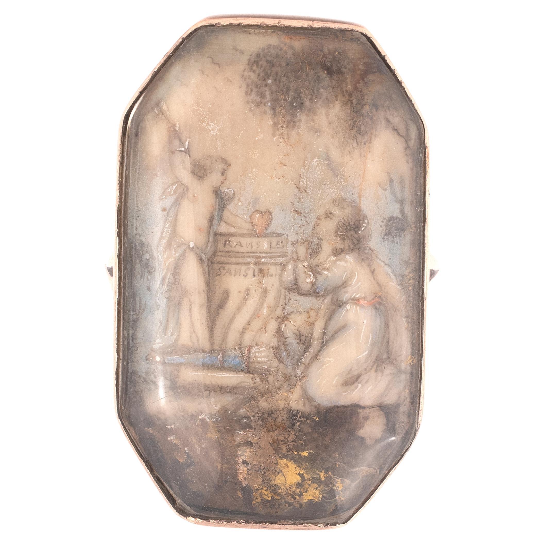 An unusual Georgian mourning ring that was made circa 1790's, with a miniature depicting a child praying before an angel.
Size: 6 1/2
Weight: 5.5gr.
The octagonal miniature measures 31mm x 19mm.
The MFA jewelry collection is compact but diverse,