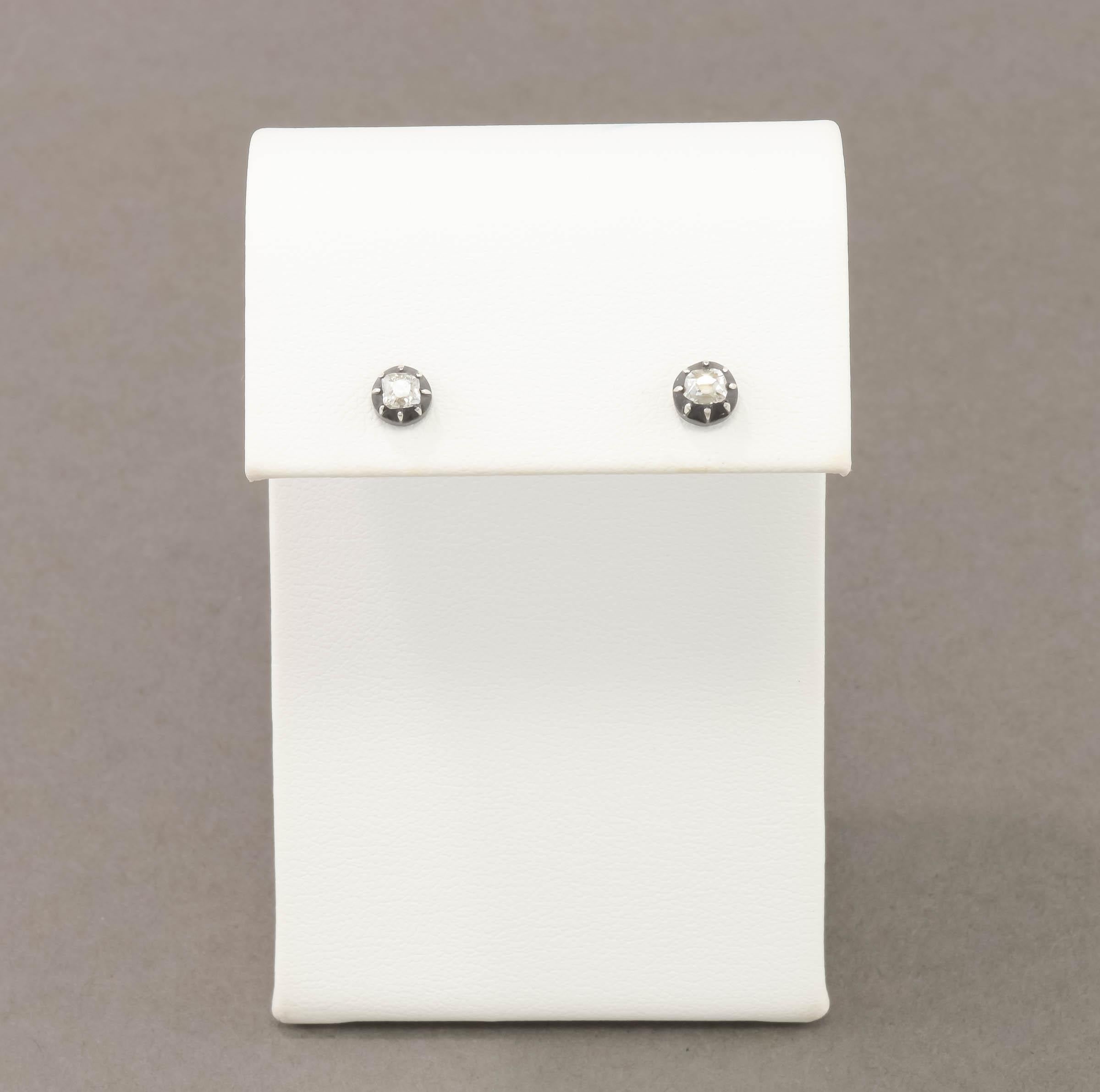 Offered is a one-of-a-kind pair of diamond stud earrings made with Georgian period old mine cut diamonds in their original old 
