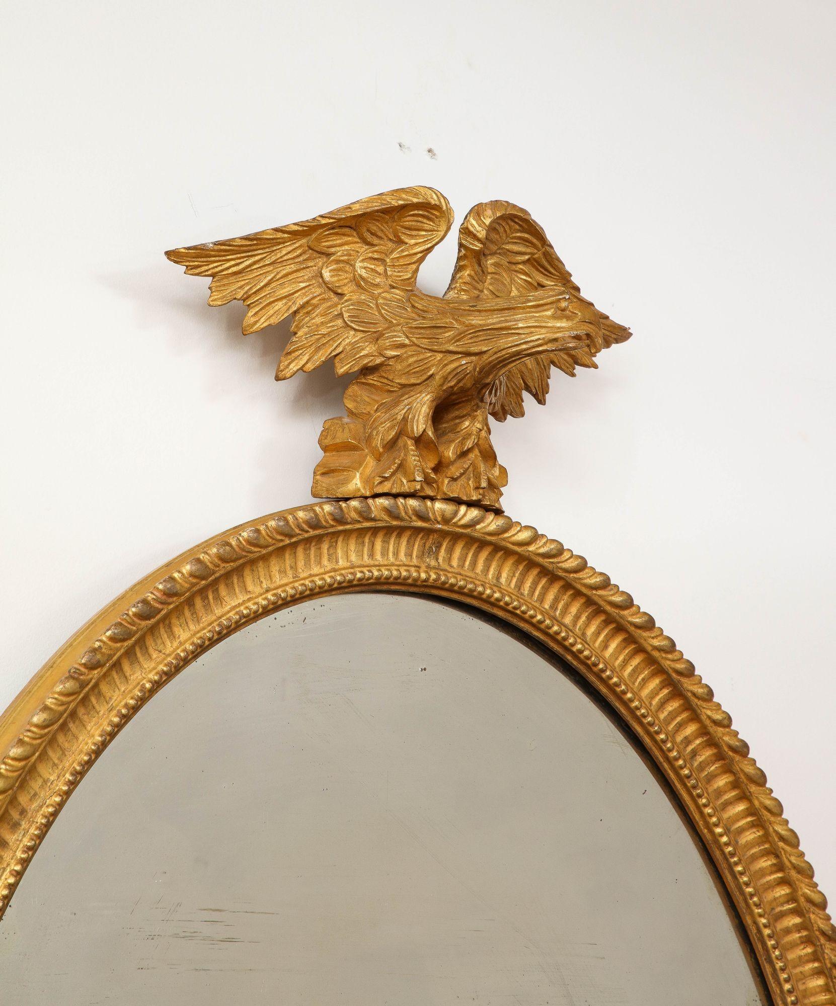 Georgian Oval Giltwood Mirror with Eagle Crest In Good Condition For Sale In Greenwich, CT