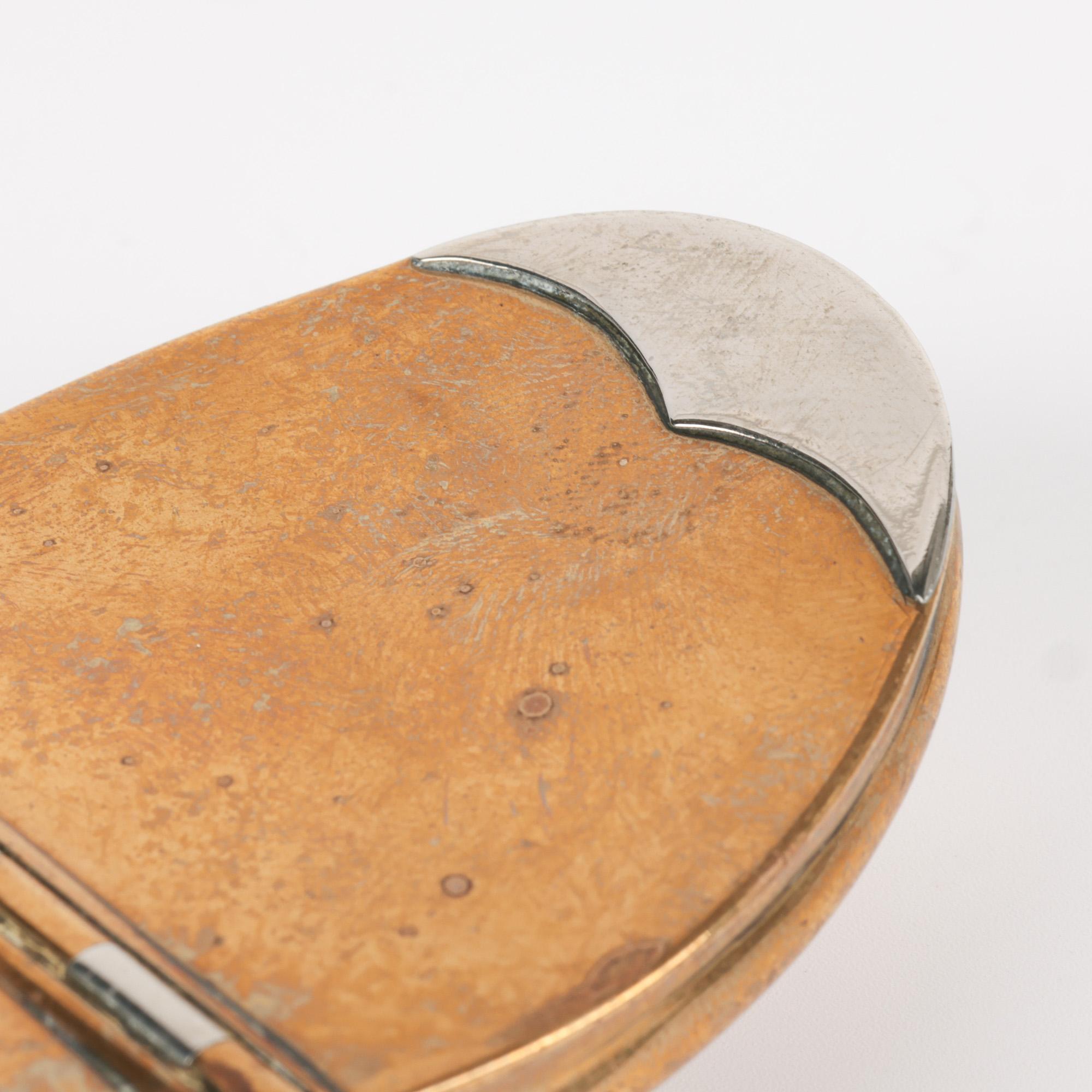 A finely made English Georgian silver mounted oval shaped pocket snuff box dating from the early 19th century. The snuff box is of oval shape curved upwards at either end probably to make it easier to disguise when carried in a pocket. Our research