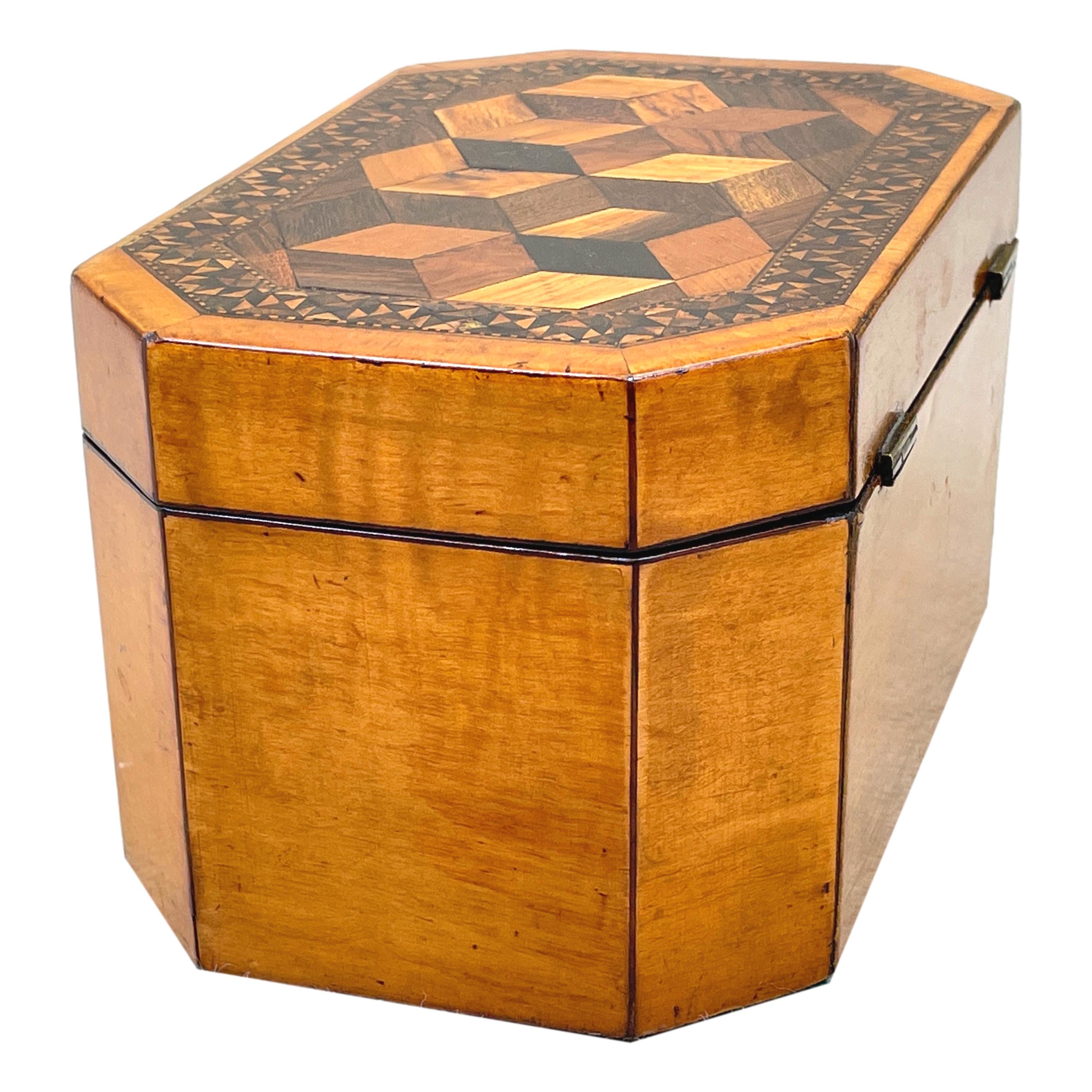 A very attractive George III period satinbirch wood tea caddy with elegant specimen wood parquetry inlaid decoration to top and further tunbridge ware inlaid decoration throughout having double lidded interior. 

This is a lovely, attractive