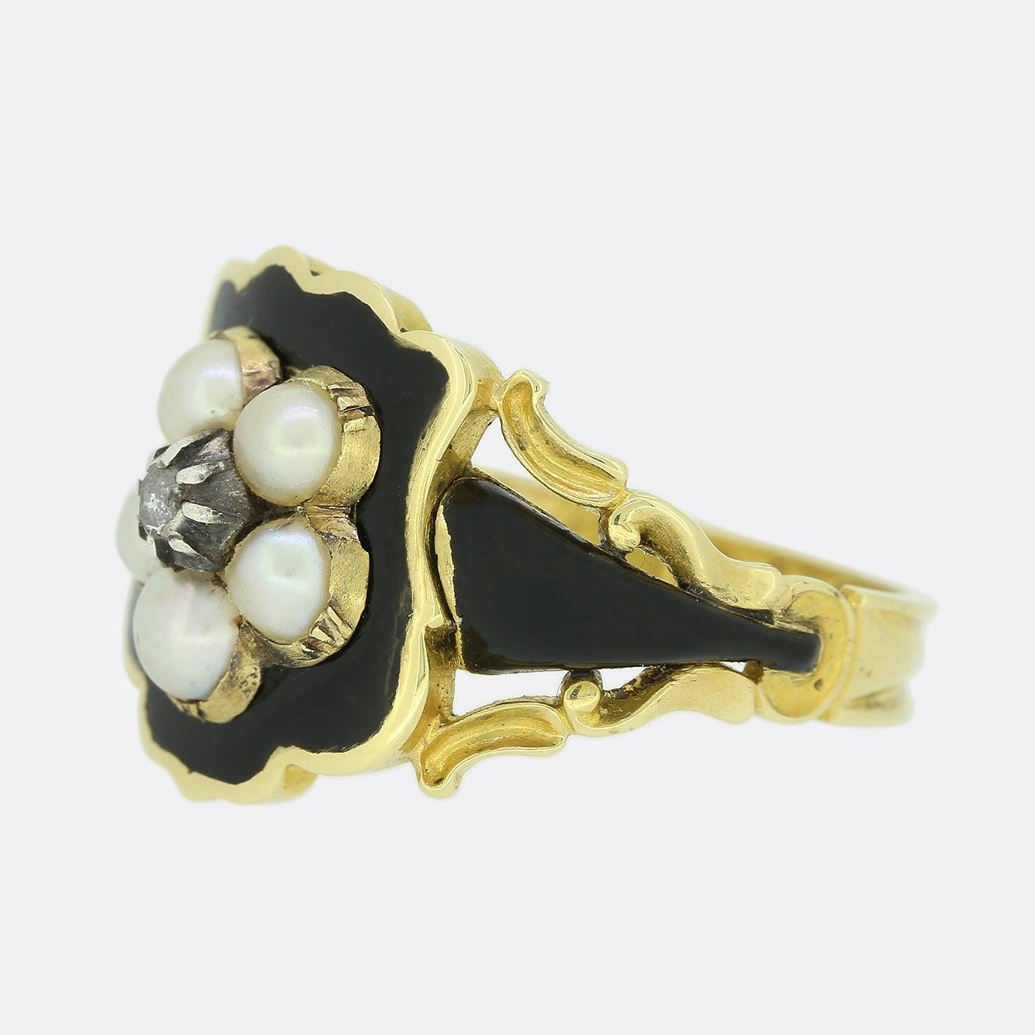 This is a wonderfully hand made yellow gold Georgian mourning ring. The ring is set with a central rose cut diamond in a cut collet setting and is surrounded by five original natural pearls. Fine black enamelling fills a shielded face and continues