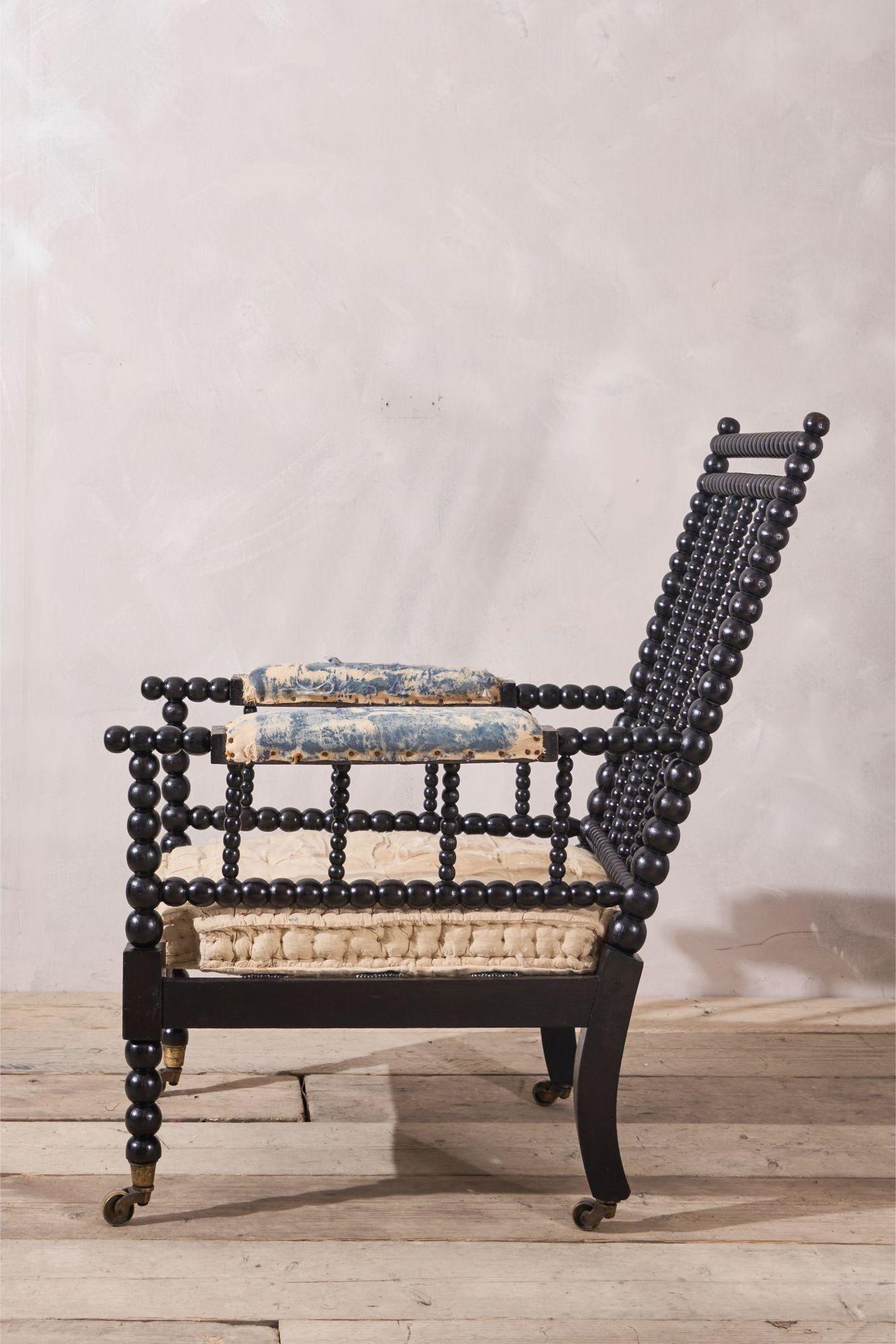 19th Century Georgian period Ebonised bobbin library chair