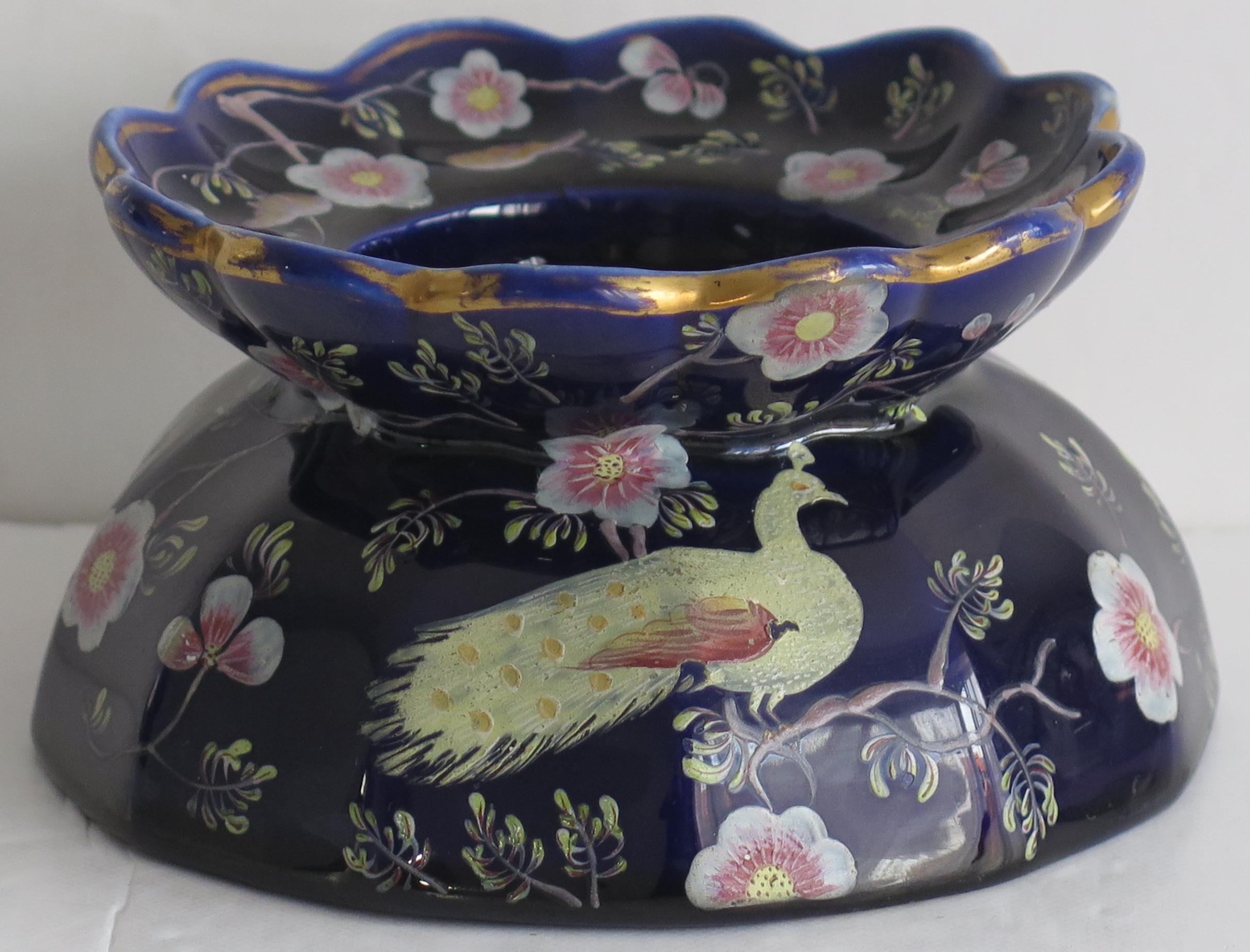 This is a very rare, ironstone Ink Well, all beautifully hand painted, made by Mason's, of Lane Delph, Staffordshire, England, circa 1815-1820. 

This piece is well potted as an open, vertically fluted dish and may have had an inner insert section