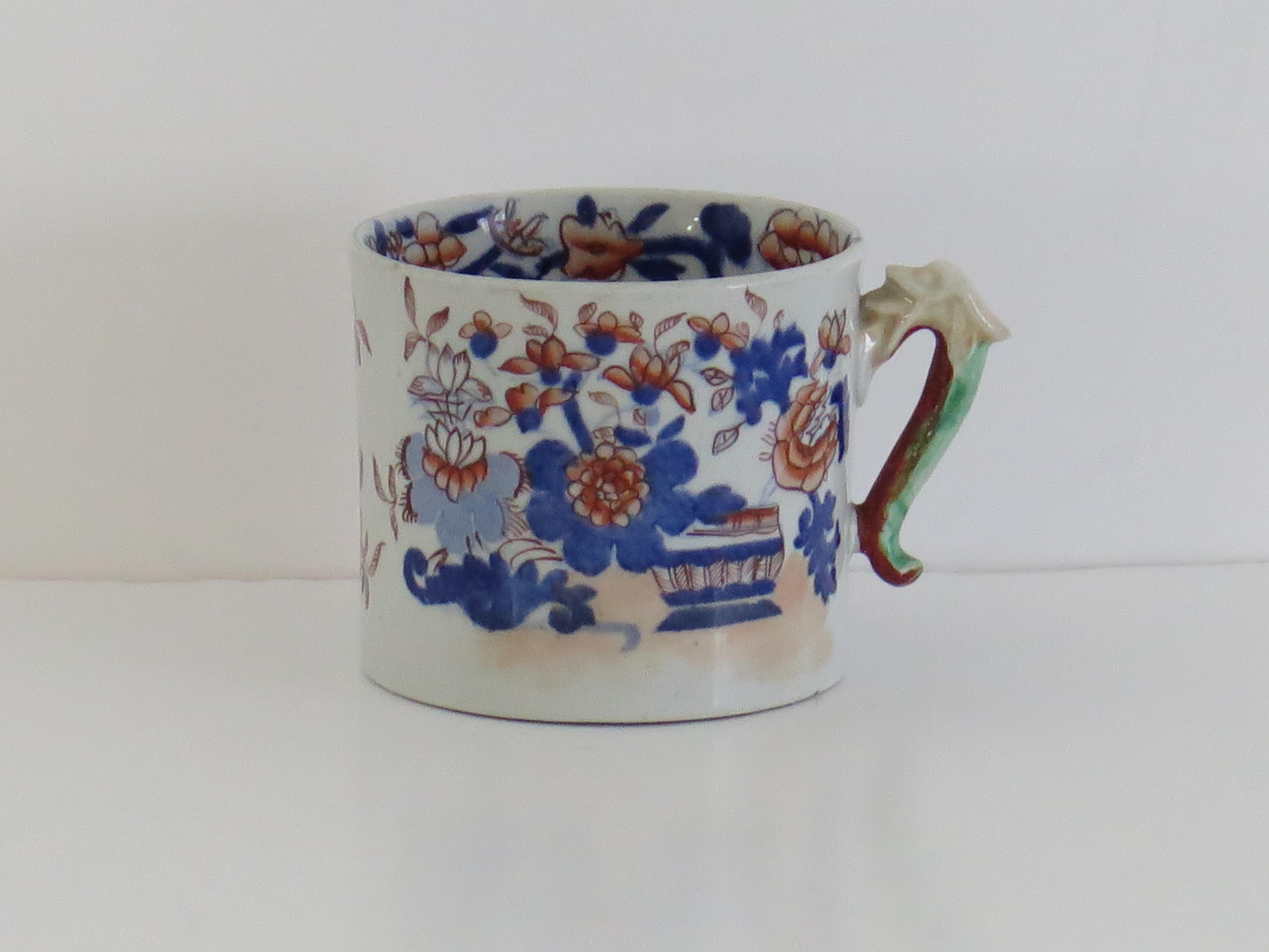 This is a good Ironstone pottery mug made by the English factory of Mason's Ironstone, fully marked and dating to the early 19th century, circa 1820.

Early Mason's mugs tend to be fairly rare and hard to find.

The mug is cylindrical with nominally