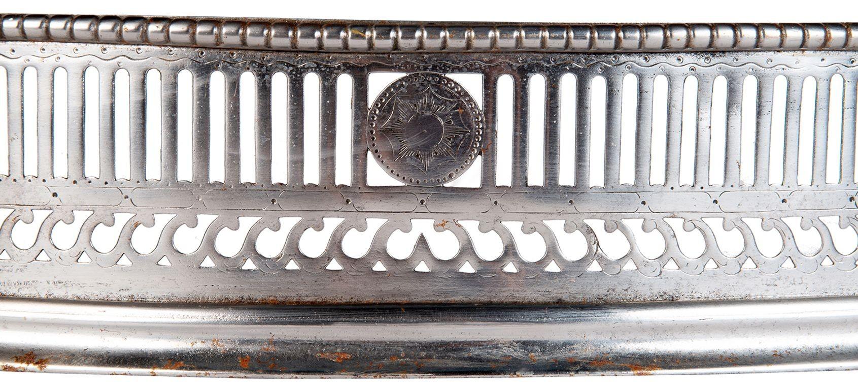 A good quality Georgian period polished and pierced serpentine shaped Steel fire place fender.


Batch 74 G9404/21. UZKN