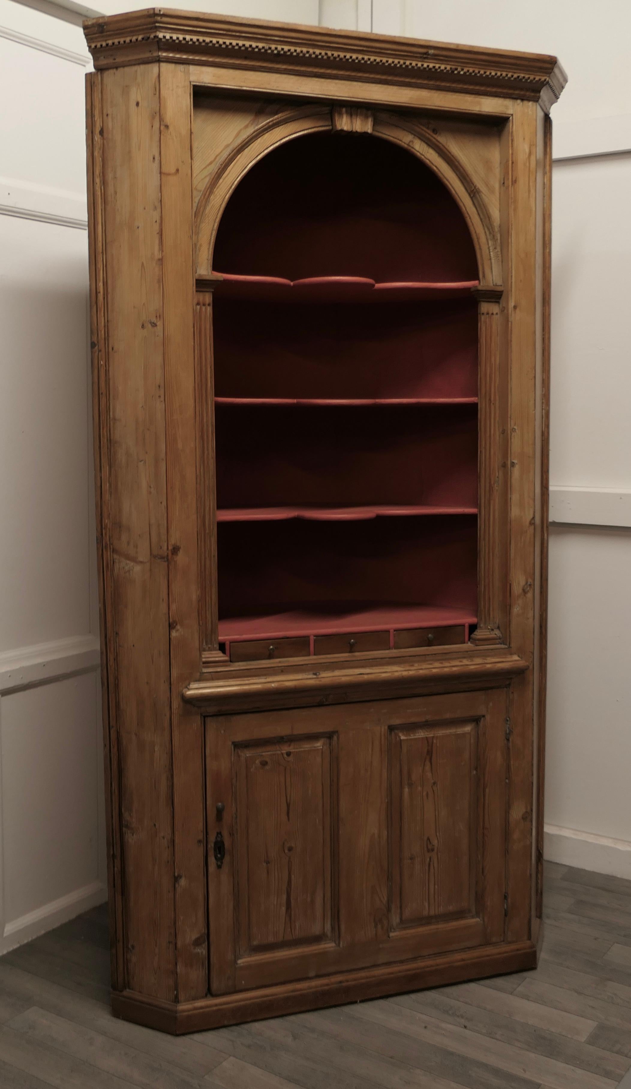 Georgian pine barrel back shelved corner or alcove cupboard 

This is a wonderful old architectural piece, it is a floor standing unit and would have been made to fit in to an alcove in a Georgian room

At the bottom there is a shelved cupboard,