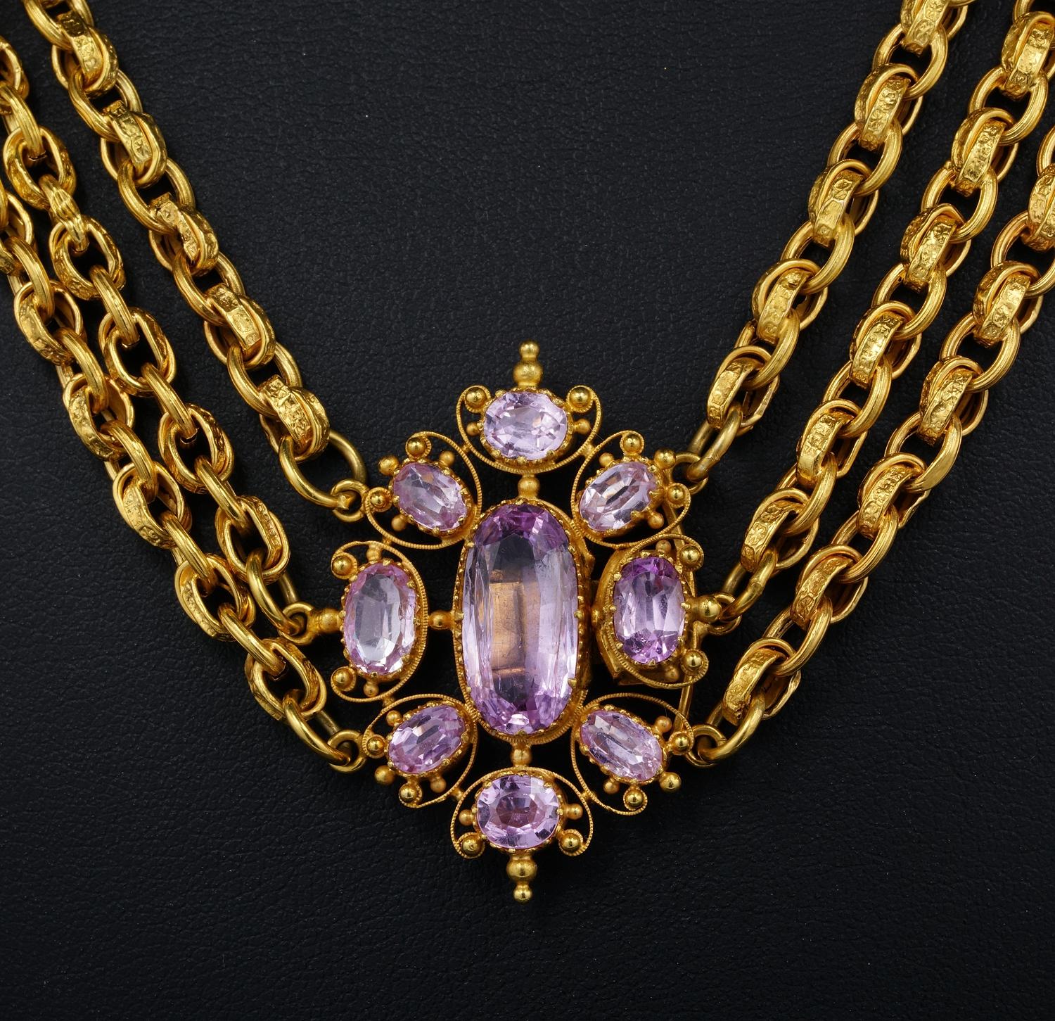A Georgian magnificent multi-chain and Pink Topaz cannetille work necklace, 1800 ca
Solid 18KT – rich gold colour multi chains lead to the main center of cannetille work close back set  natural Pink Topaz arranged in flower like cluster and finely