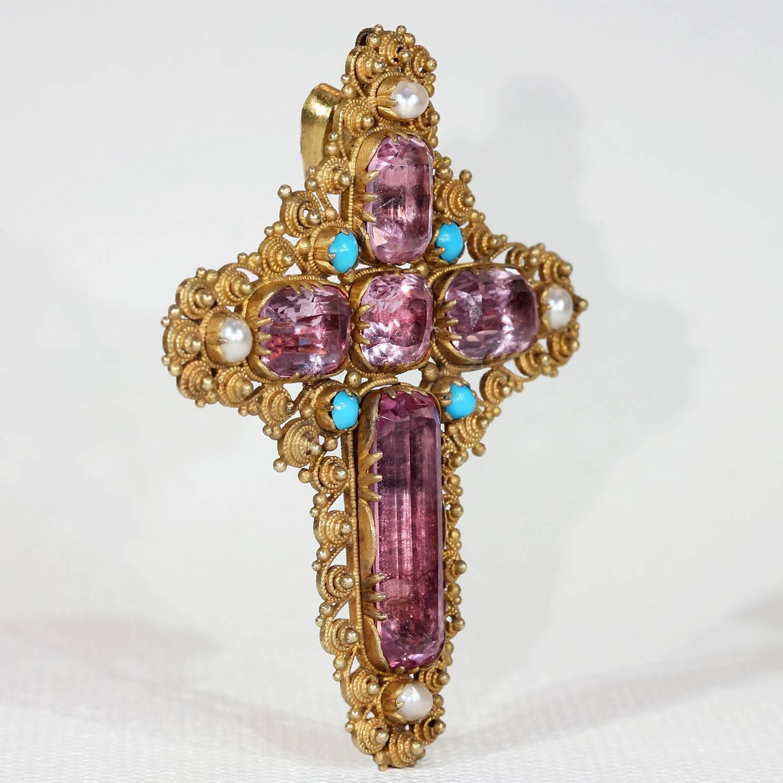 The Georgian Era saw quite a few upheavals in fashion and culture in its 100 + year history. Topaz was a popular gemstone throughout the era, along with garnets, emeralds, rubies, pearls, and turquoise. Crosses and crucifixes were also in favor.