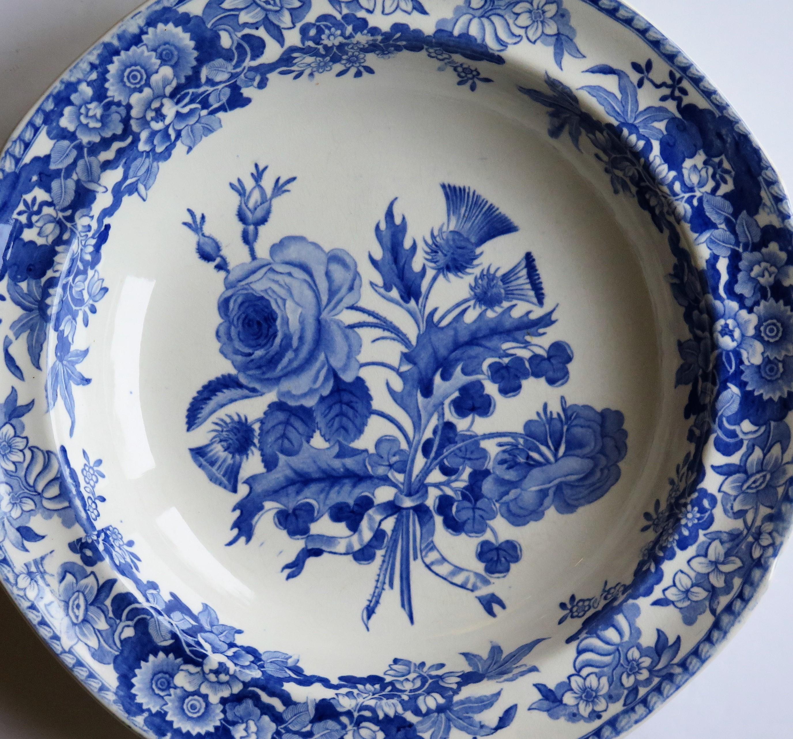 This is a beautiful deep plate or bowl in the blue and white Union Wreath Pattern No. 3, produced by the Spode factory and made of a type of earthenware pottery called Pearl-ware, in the early 19th century, circa 1820.

The pattern is called