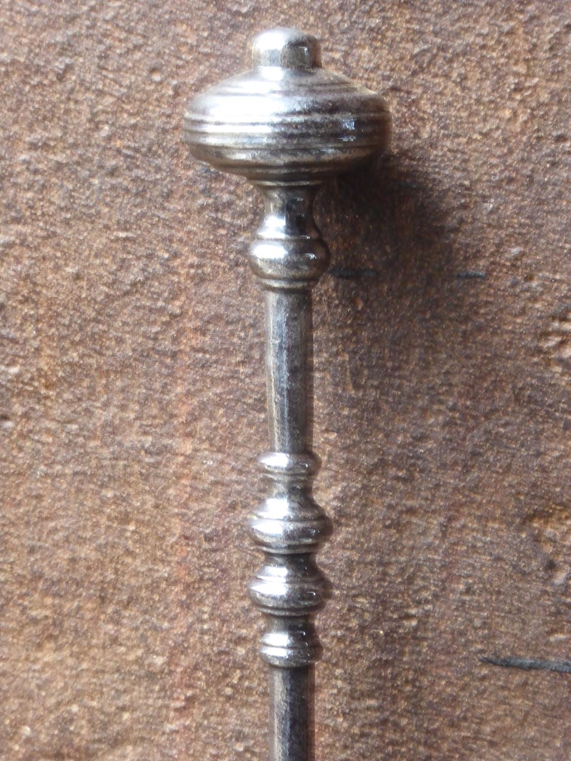 18th-19th century, English fireplace poker made of polished steel.








 