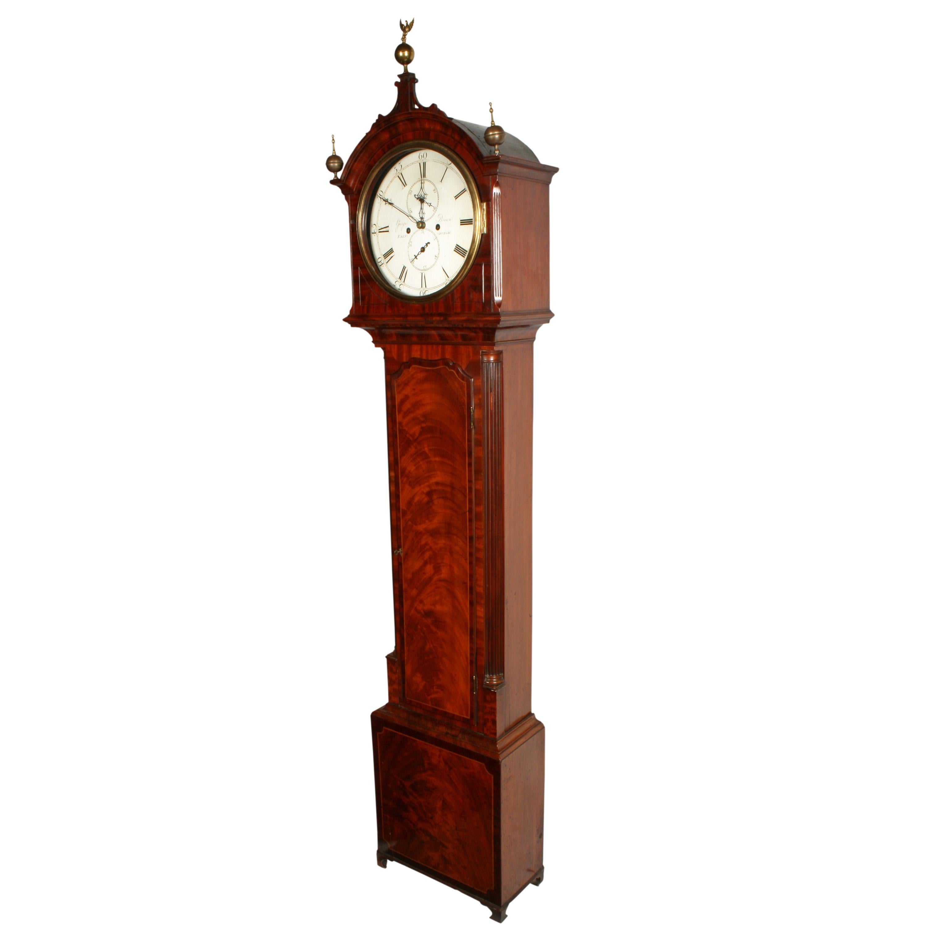 A late 18th to early 19th century Scottish Georgian mahogany grandfather clock.

The clock has an eight day movement that strikes the quarter hours on three bells.

The mahogany case has a long broad door that is crossbanded and box wood inlaid,