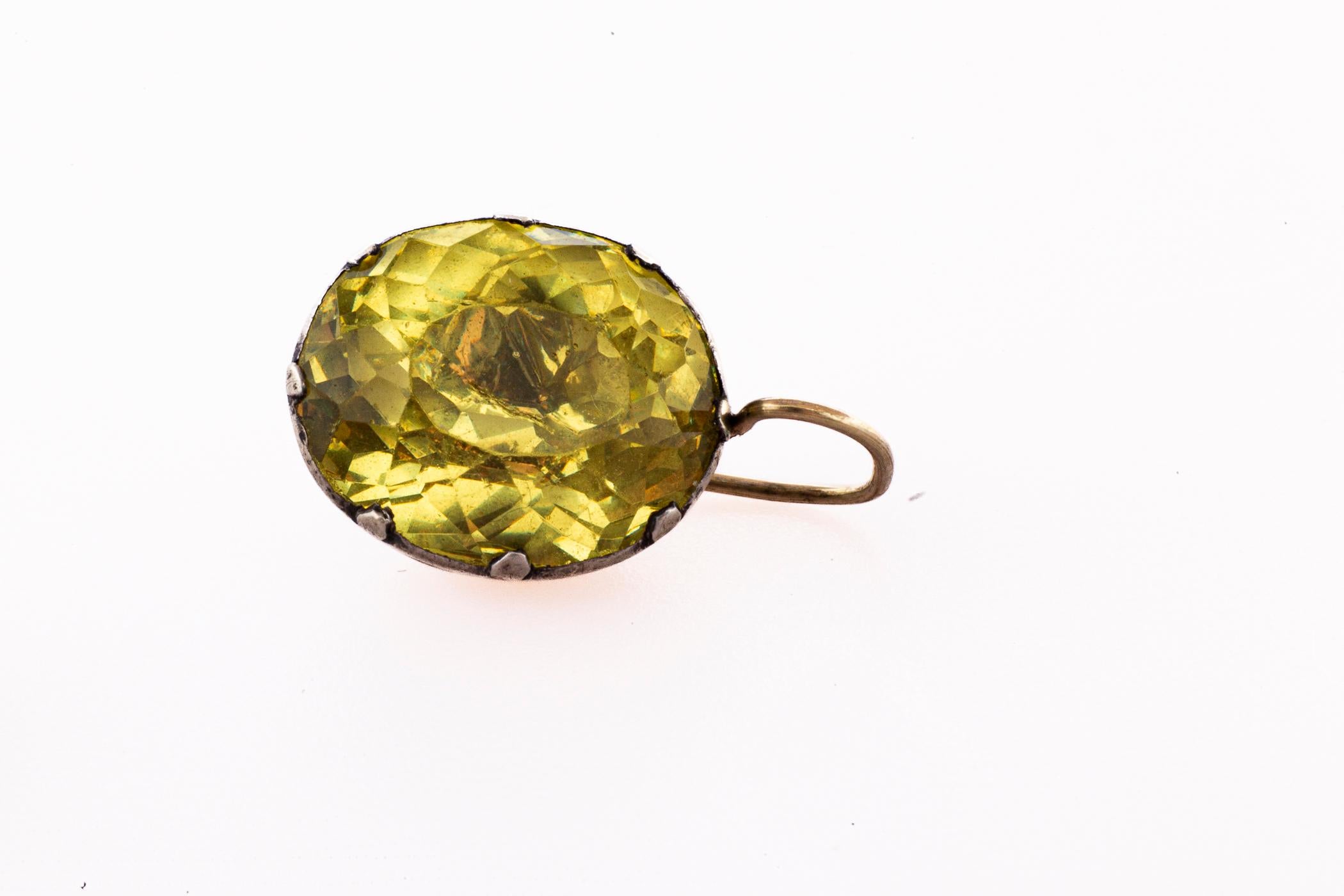 A startling color of chartreuse and unusually large carat size make these Georgian Paste Earrings exceptional. The color is almost neon. These are earrings to wear morning until evening, weddings to sports clothes. The backs are silver The ear wires