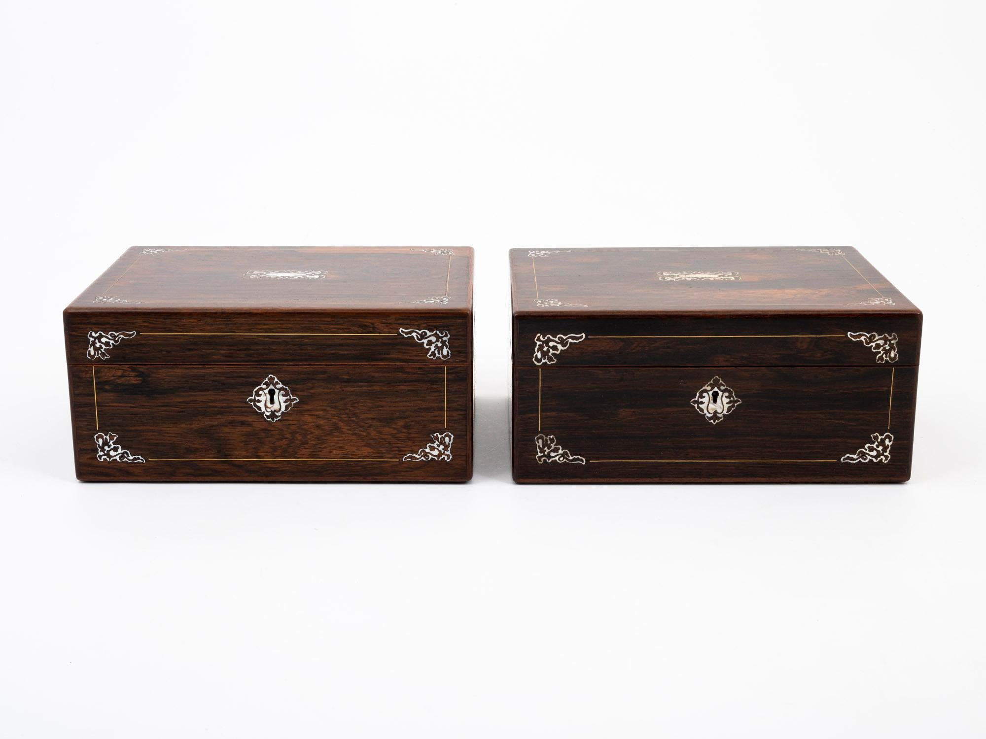 Rosewood and Mother of Pearl

From our Sewing Box collection, we are thrilled to offer this pair of Georgian Rosewood Sewing Boxes. The Sewing Boxes of rectangular shape veneered in figured Rosewood. The Sewing Boxes a mirror of one another with