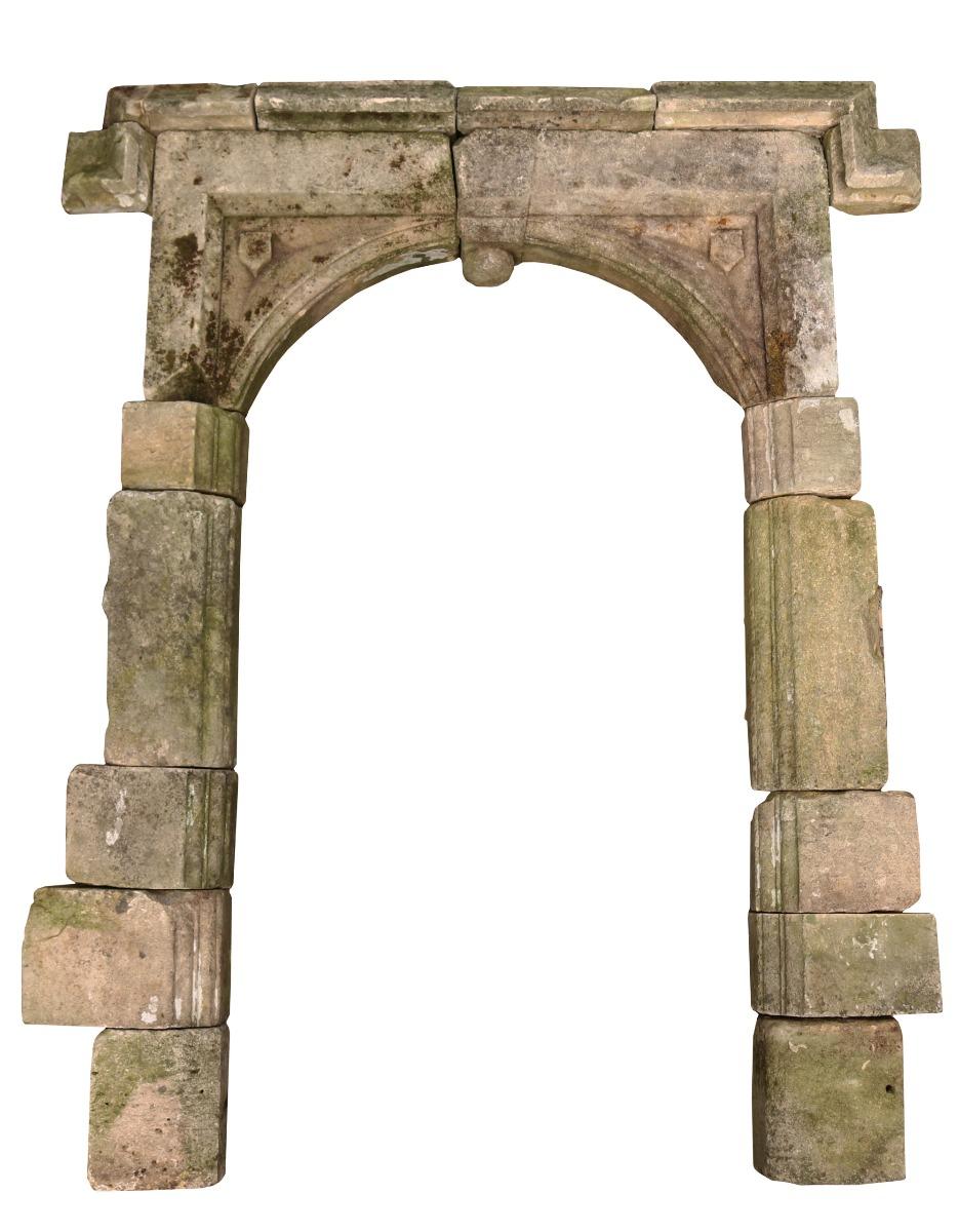 An 18th century English Gothic stone doorway.

Additional dimensions:

Exterior

Height 237 cm

Width at base 166 cm

Widest part 190 cm

Depth (deepest part) 32 cm

Internal

Opening height 200.5 cm

Opening width 112 cm.
  
