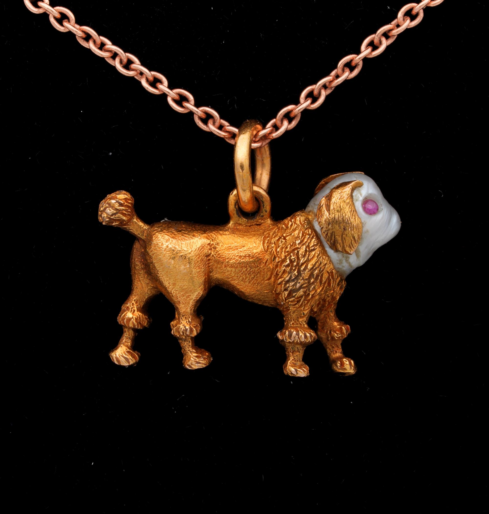Little Past Treasure

Past little treasure from the Georgian / Regency period – 1800 ca
Artistry made of solid 18 Kt gold is a little dog very finely made with natural pearl head and ruby eyes – measures 17 mm. x 20 mm. with 4.8 grams gross weight
A