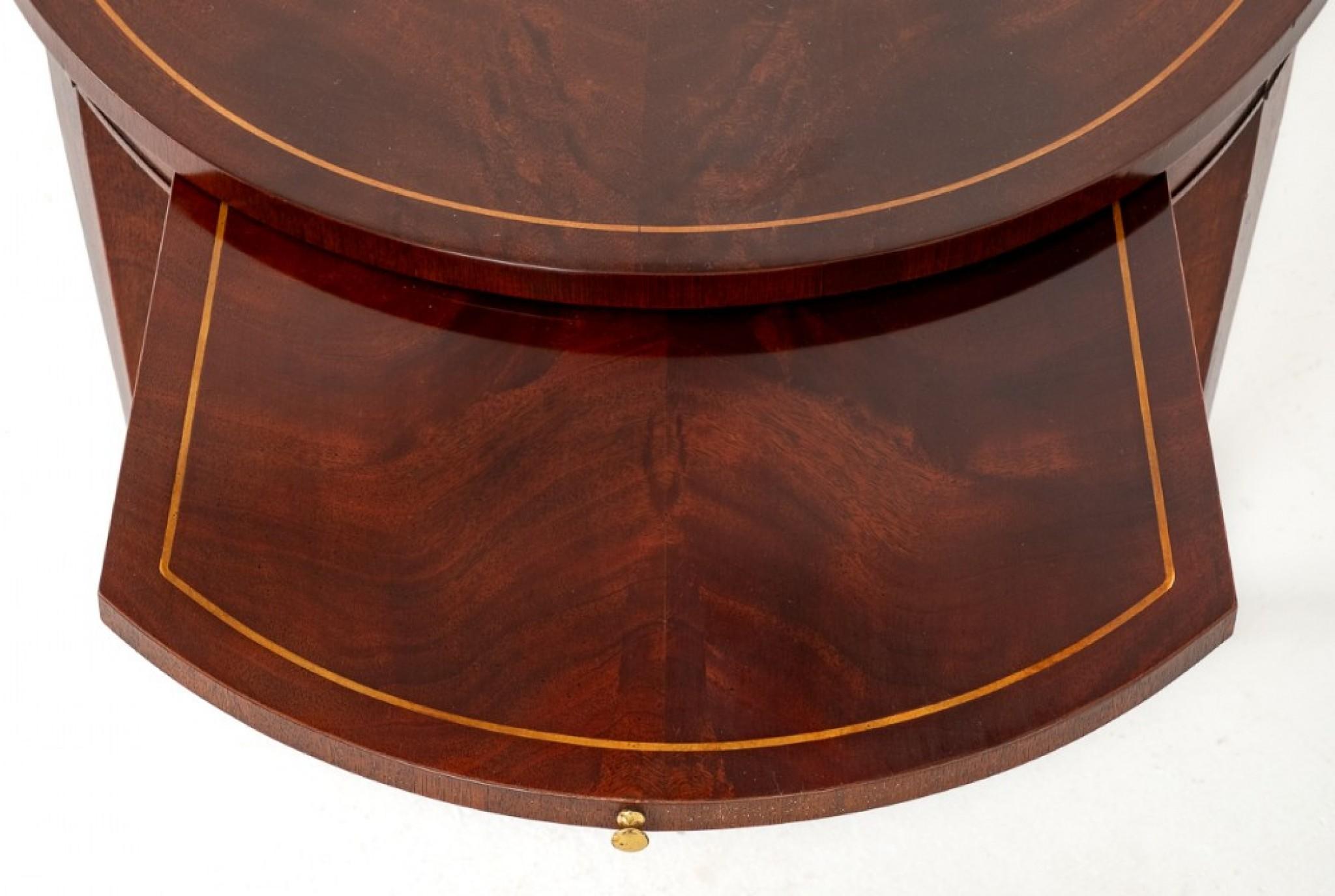 Good Quality Georgian Revival Mahogany Coffee Table.
Circa 1920
This Coffee Table is Raised upon Square Tapered Legs which Retain Their Original Brass Box Castors.
The Top of the Table Features Wonderful Flame Mahogany Timbers and Boxwood Line