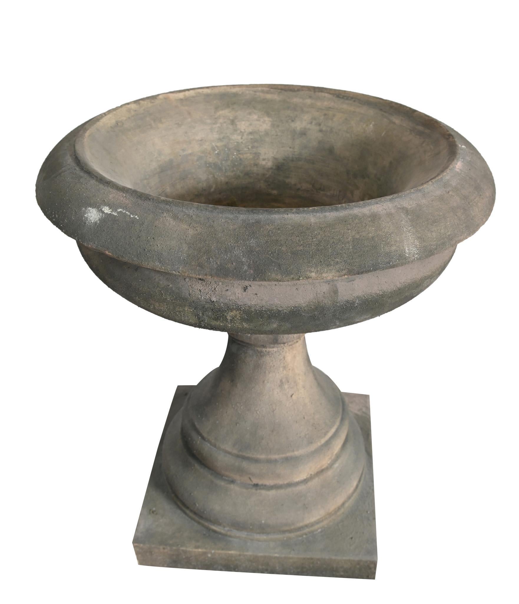 You are viewing a gorgeous Georgian revival garden tazza
Quirky little urn on stand that could also function as a nice bird bath
Crafted from reconstituted stone with lovely weathered look
Offered in great shape ready for home use right away
We ship