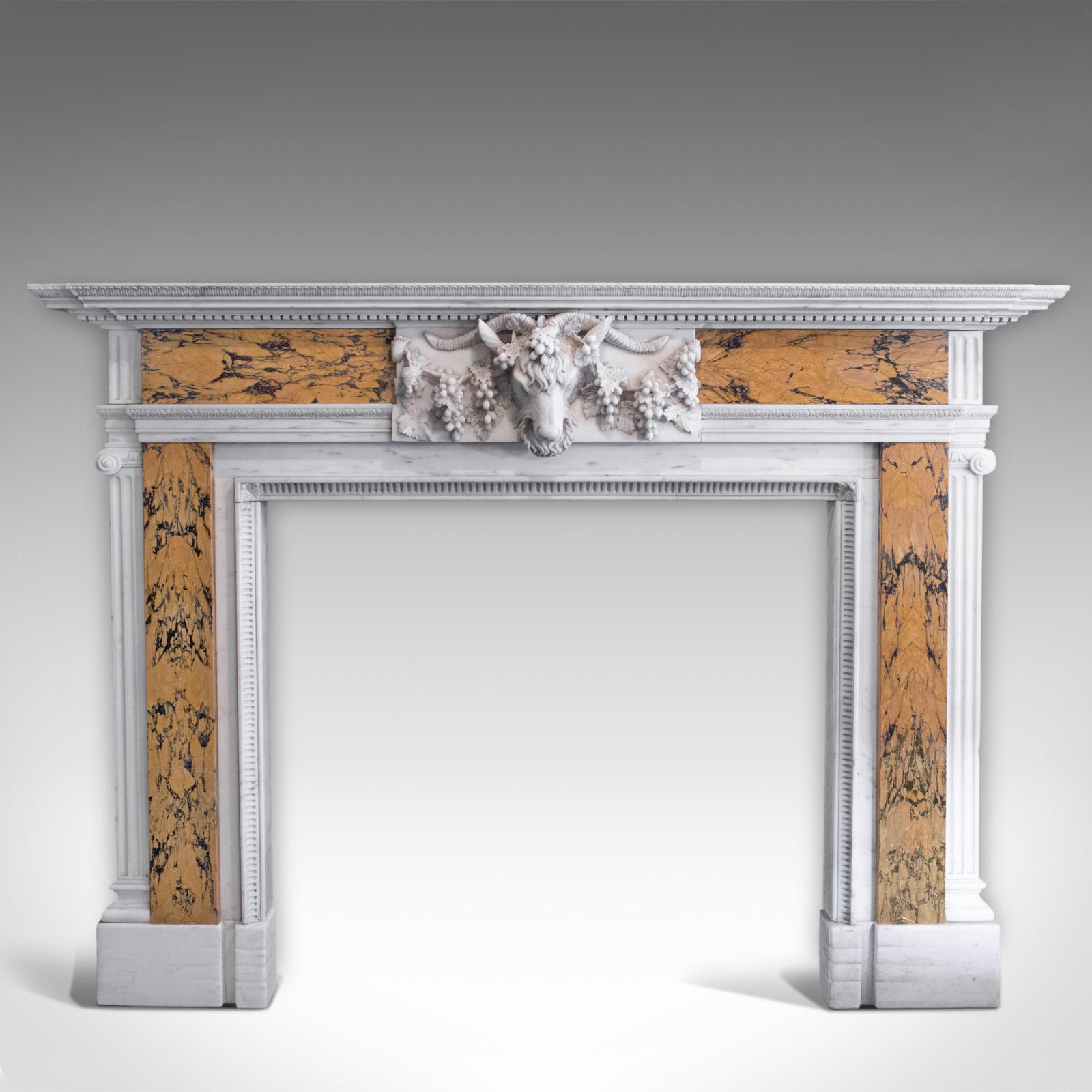 This is a Georgian revival marble fireplace. An English, fire surround with mantelpiece in the classical taste by Dominic Hurley, dating to the late 20th century, circa 1980.

A fireplace of exacting proportion displaying Palladian overtones
In