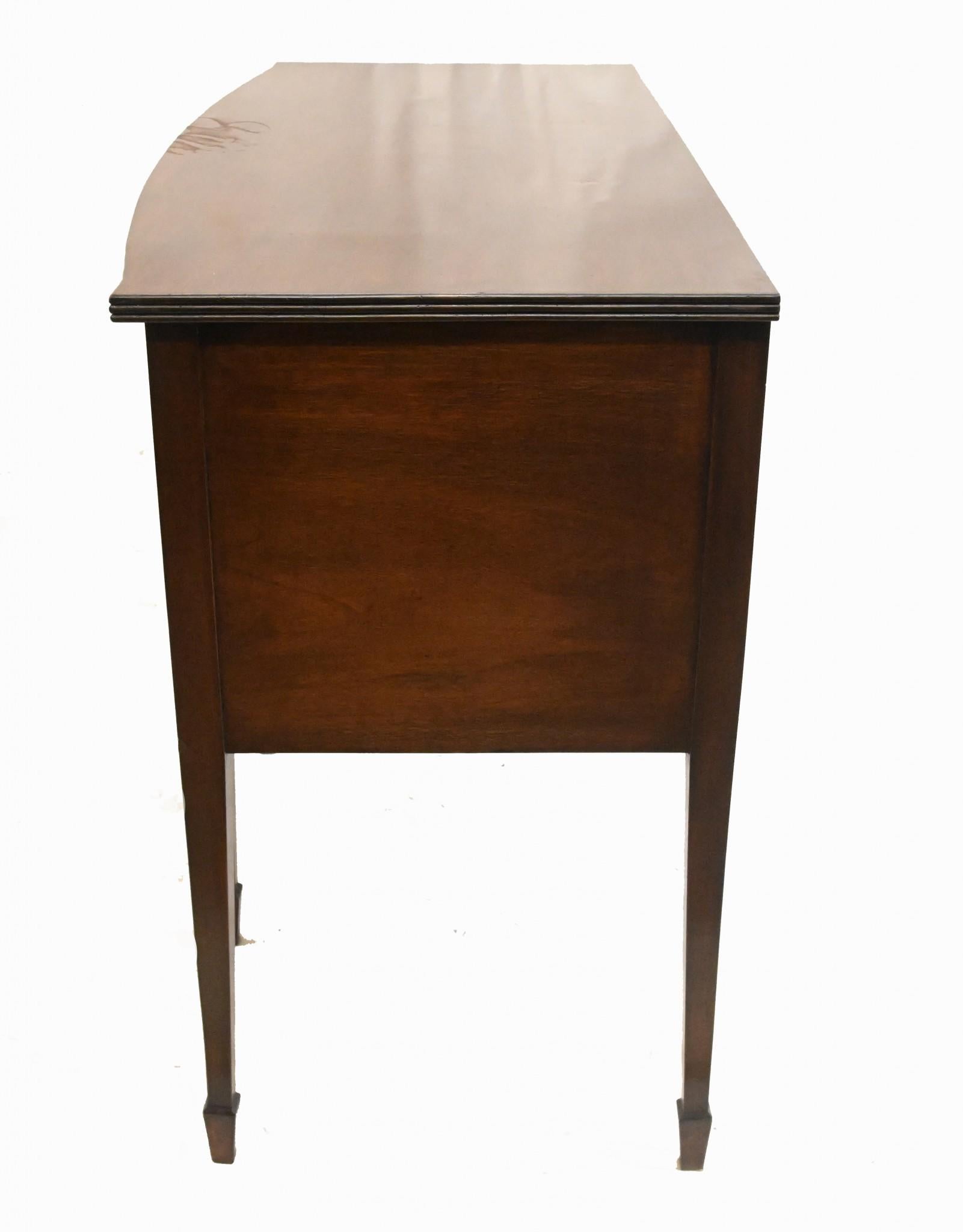 You are viewing a gorgeous Georgian Revival sideboard in mahogany
Circa 1890 on this clean piece of English furniture
Features three drawers and a side cabinet
Elegantly tapered legs perfect for modern interiors
Bought from a private house sale in