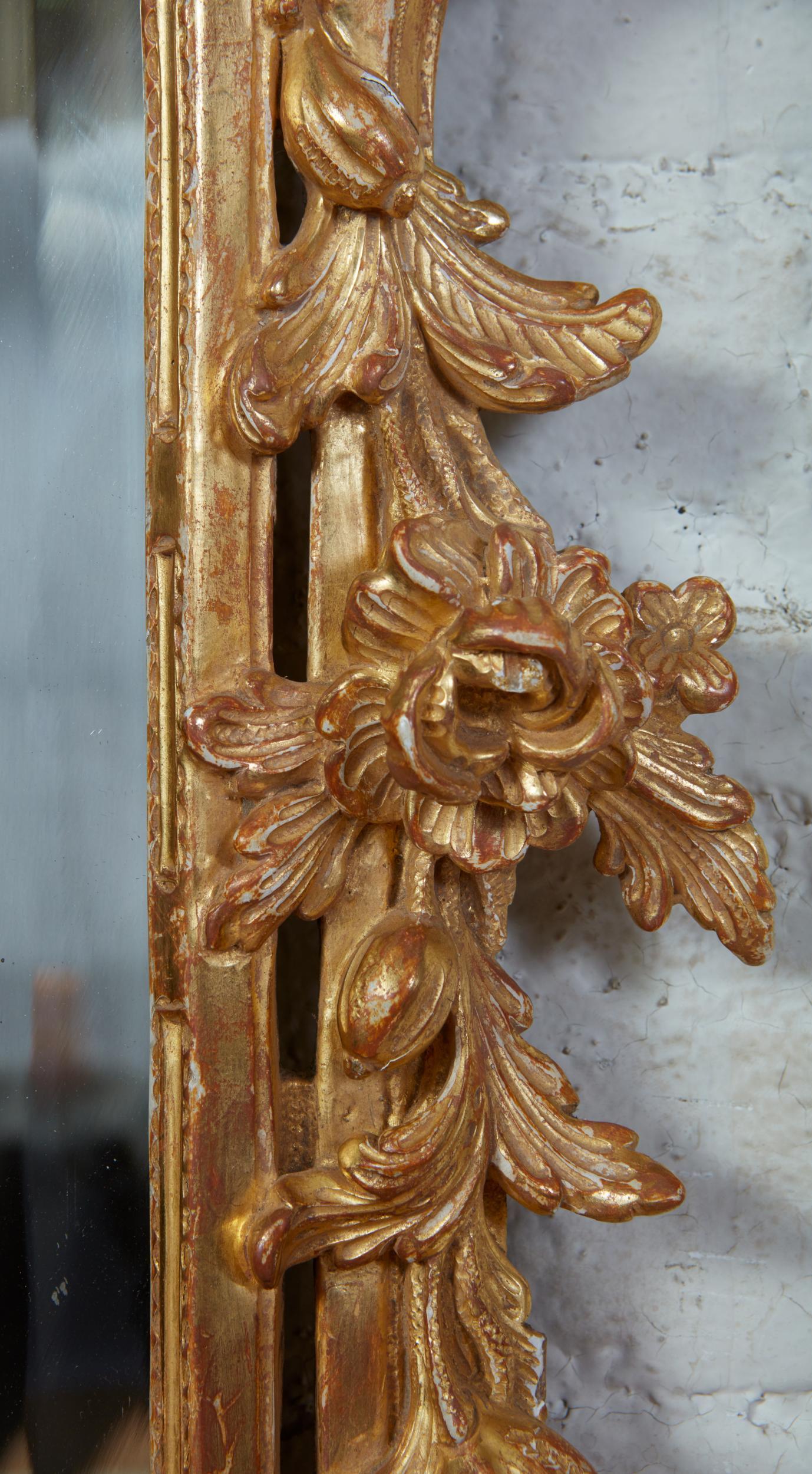 Fine George III giltwood mirror, the foliate carved crest with 