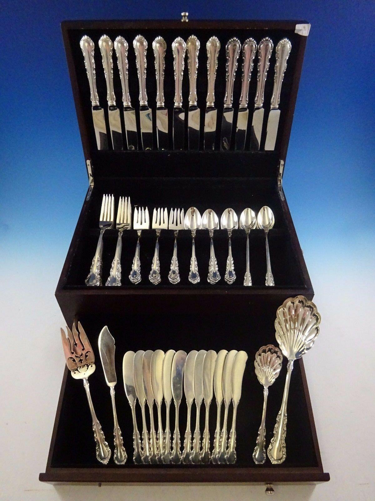 Georgian Rose by Reed & Barton sterling silver dinner size flatware set - 76 pieces. This set includes:

12 dinner size knives, 9 5/8