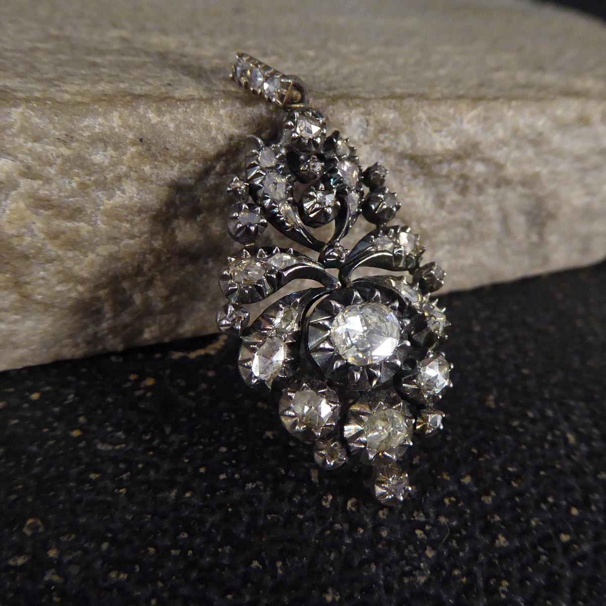 A striking pendant showing such quality aesthetic from the Georgian era. This lovely pendant features approximately 1.50ct of Rose Cut Diamonds in a closed back setting regularly used in Georgian jewellery. In such lovely condition and wearable,