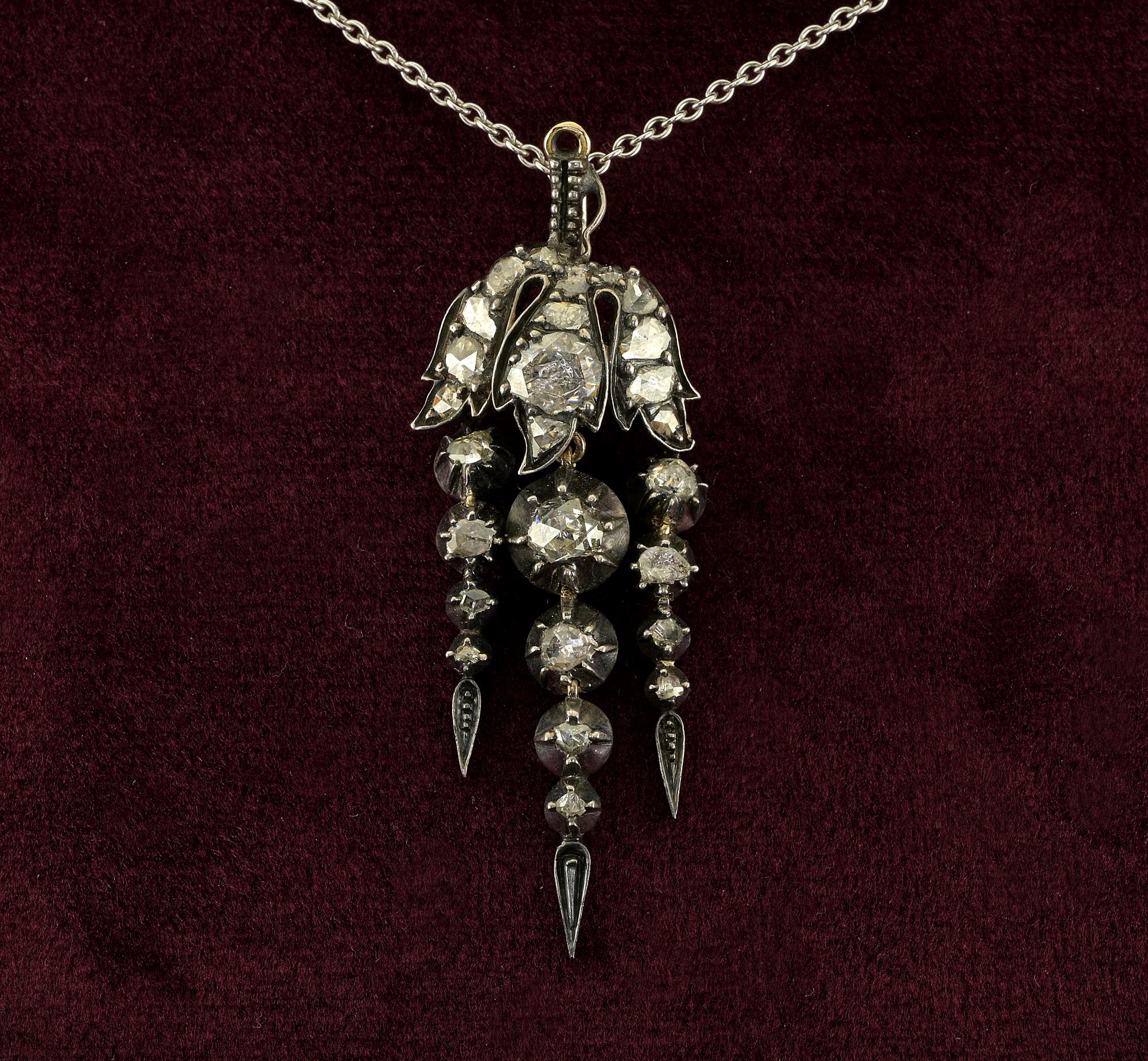 This marvelous Georgian era pendant has been crafted of solid 12 Kt gold topped by silver
Fascinating “En Tremblant” trembling suspended pendeloques typical of the Georgian era, 1780 ca
Adorned with white sparkly rose cut Diamonds for approx 1.30 Ct
