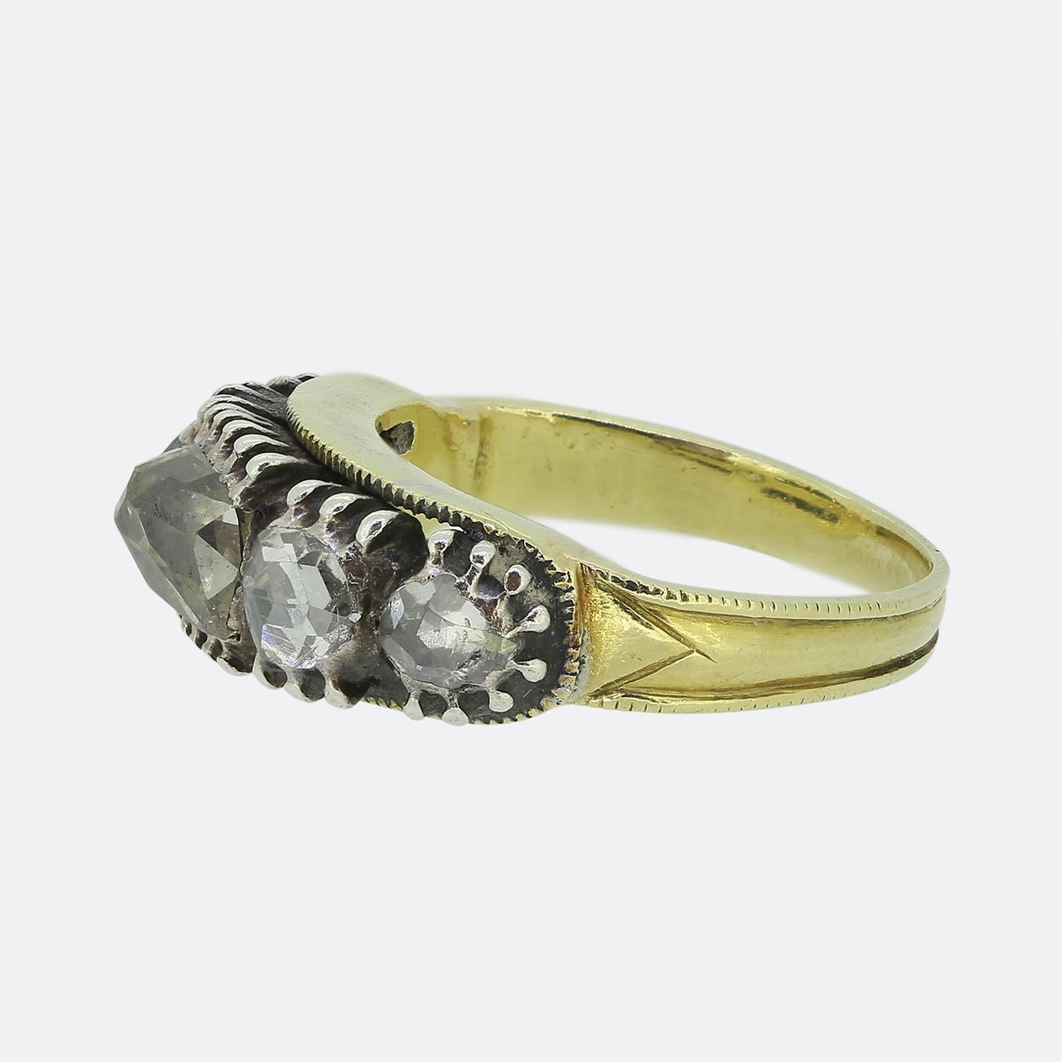 Here we have a truly wonderful Georgian diamond ring. The ring features five chunky rose cut diamonds that graduate in size with the largest in the centre. The ring is of continental origin and is crafted in 18ct yellow gold and silver.

Condition: