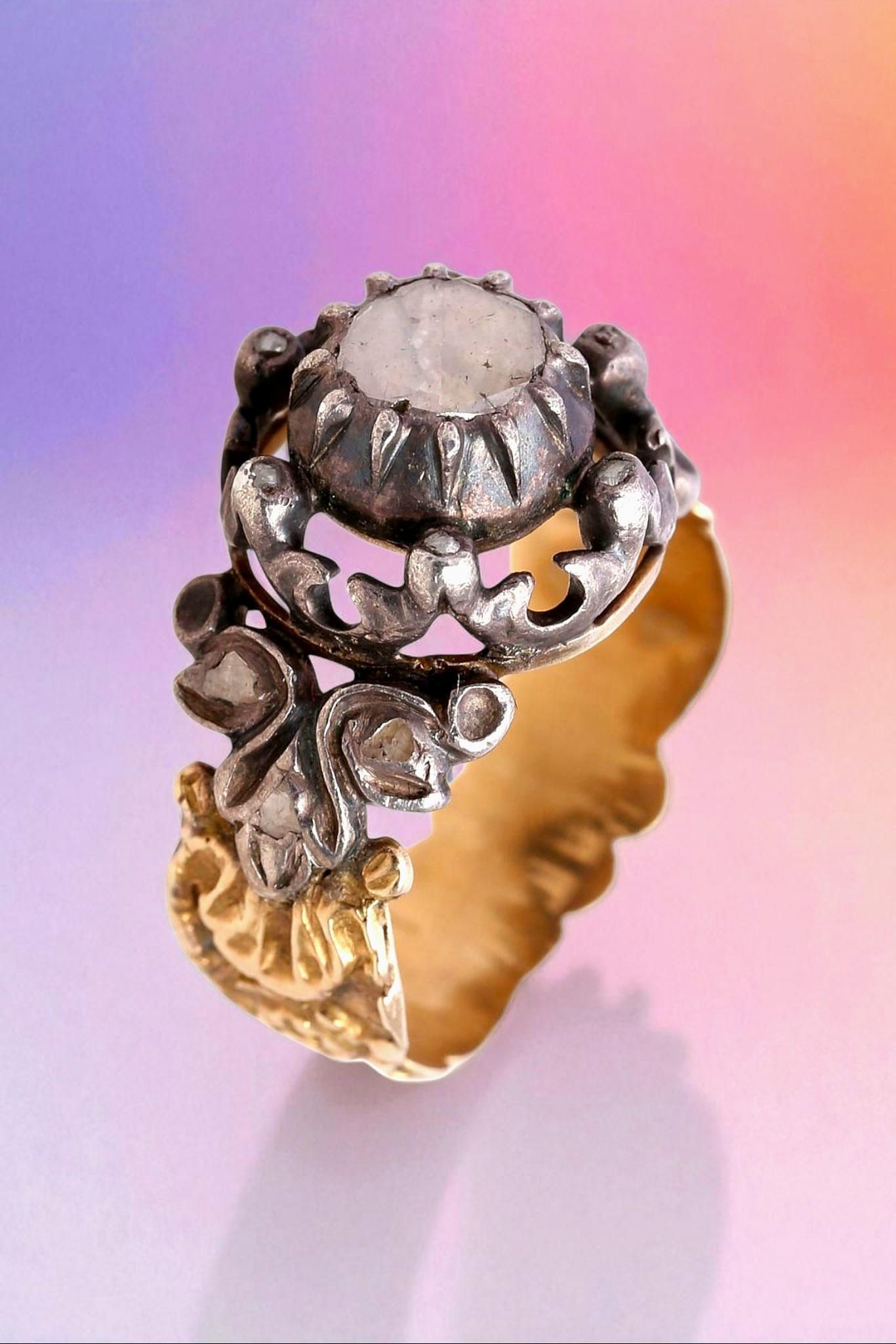 Georgian Rose-Cut Diamond Ring in 18K Gold and Silver. Ca. 1750-1850
A rare and romantic treasure from the Georgian era.

A stunning example of 18th to early 19th-century craftsmanship, this antique Georgian ring showcases a rose-cut diamond of