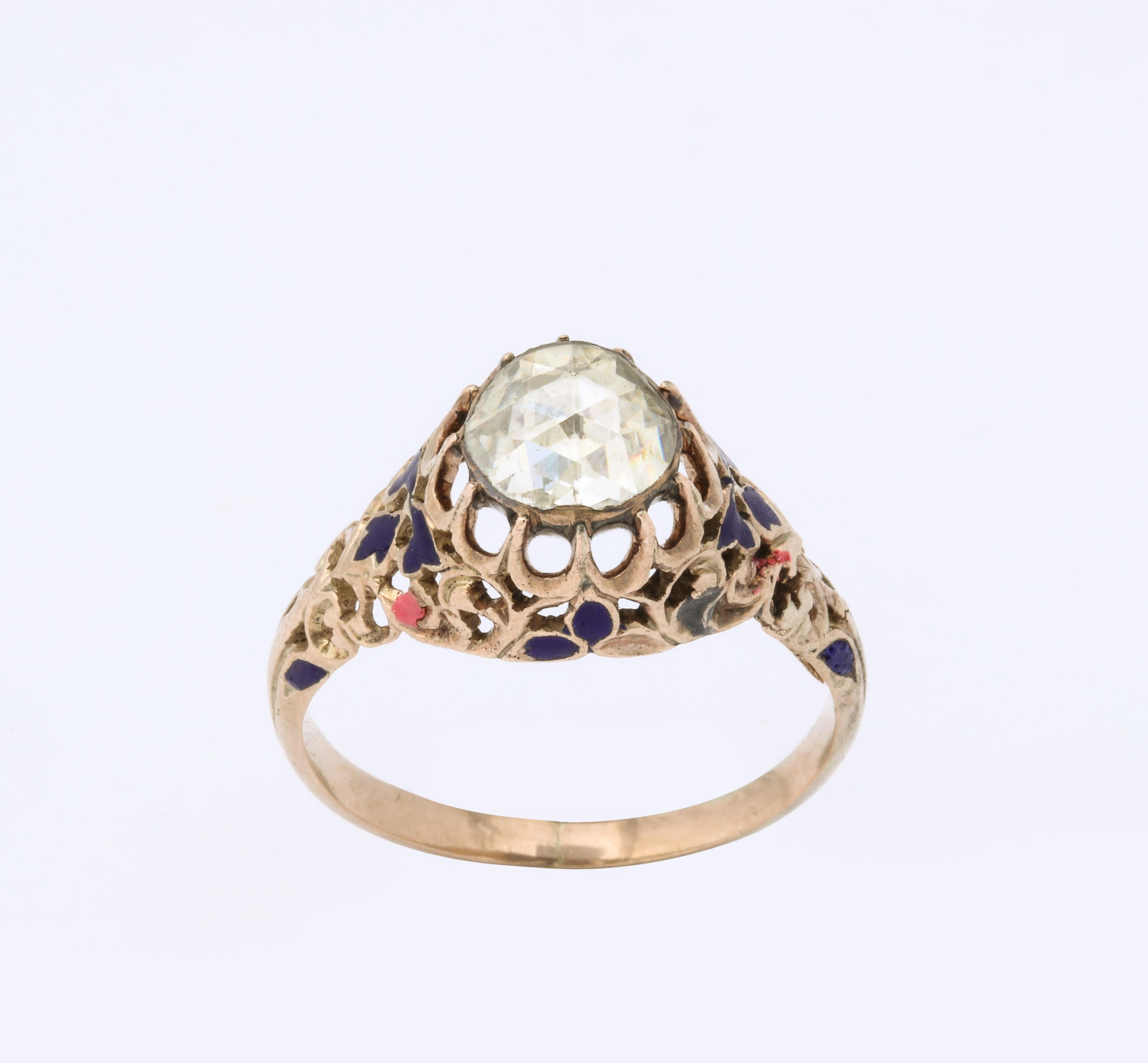 Dieser Georgian Rose Diamond Ring ist ein schönes Design mit einem .65 Karat Diamanten 
von außergewöhnlicher Qualität.  Die Montage ist 18 K und hat schöne Emaillierung (Es gibt einige fehlende Emaille aufgrund des Alters)  Sie ist europäisch  c