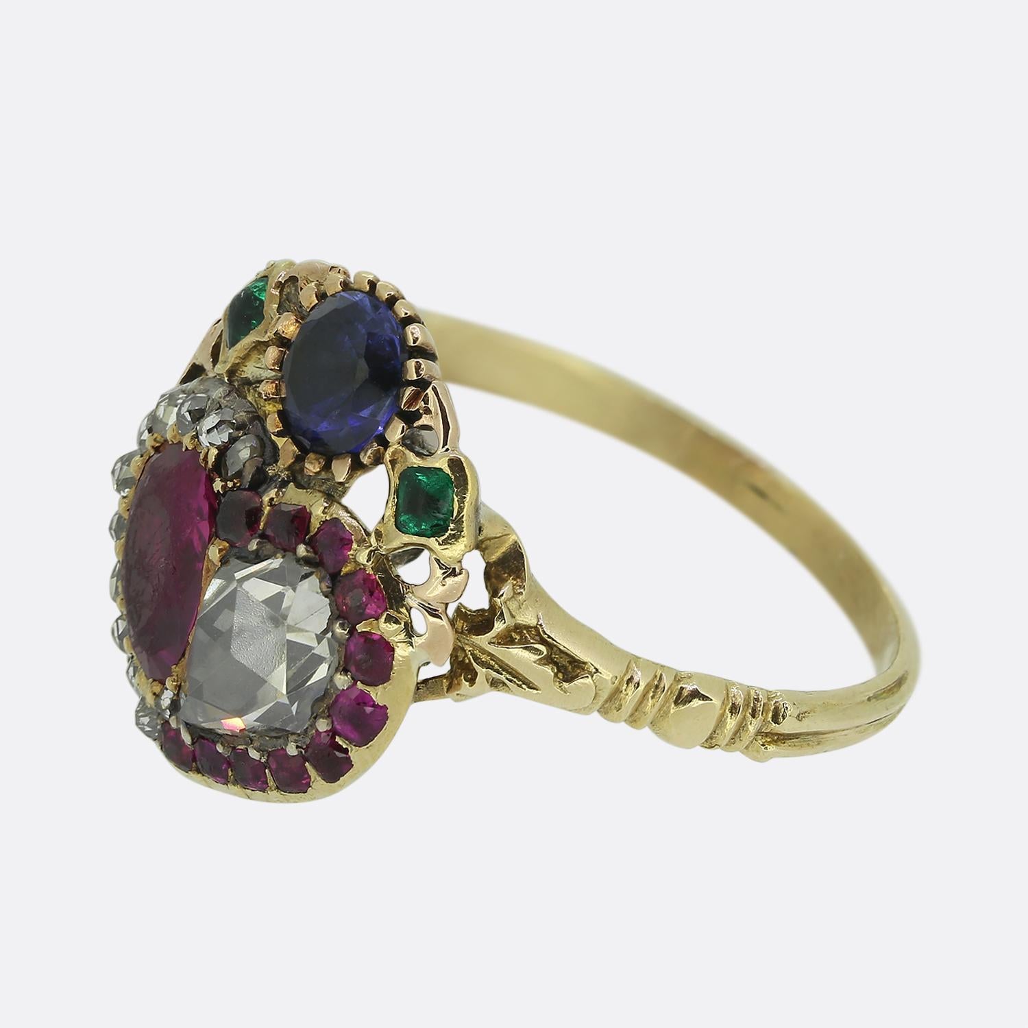 Here we have a delightful double heart ring taken from the Georgian period. This antique piece has been crafted from 15ct yellow gold and features a striking red ruby, alongside a chunky rose-cut diamond; both of which are surrounded by tiny