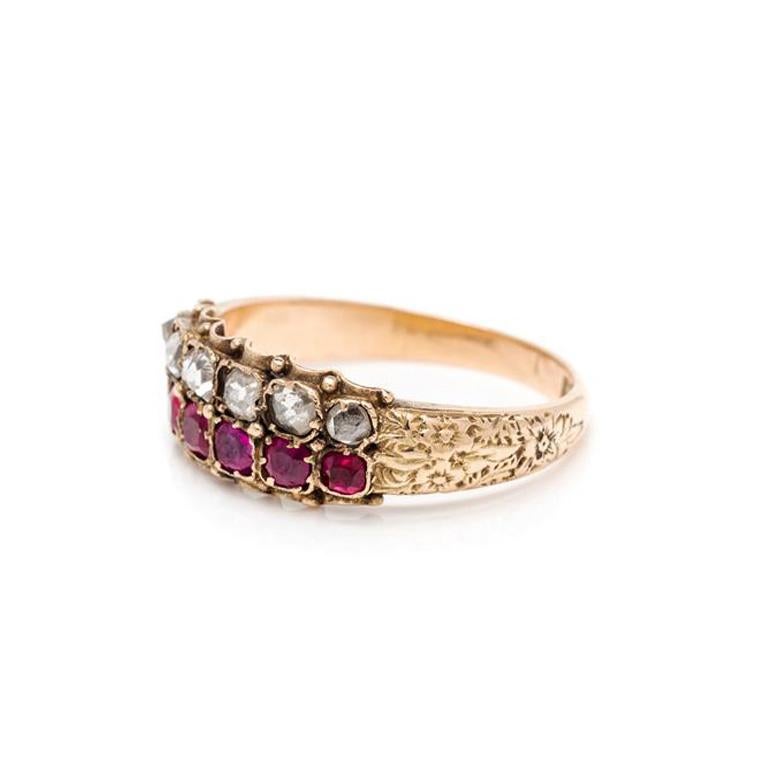 A Ruby and Diamond Ring from the Georgian Era in yellow gold, with six mixed cut rubies and six rose-cut diamonds. Ring Size US 7. Diamonds: Color (H-I).