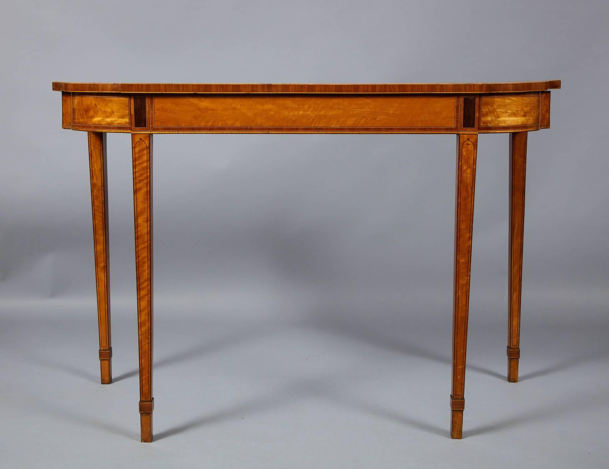 Very fine George III pier table, the top in beautifully figured satinwood with three kingwood crossbanded borders having boxwood stringing, and having a rose and honeysuckle painted bands, the apron also banded in kingwood, the legs capped with