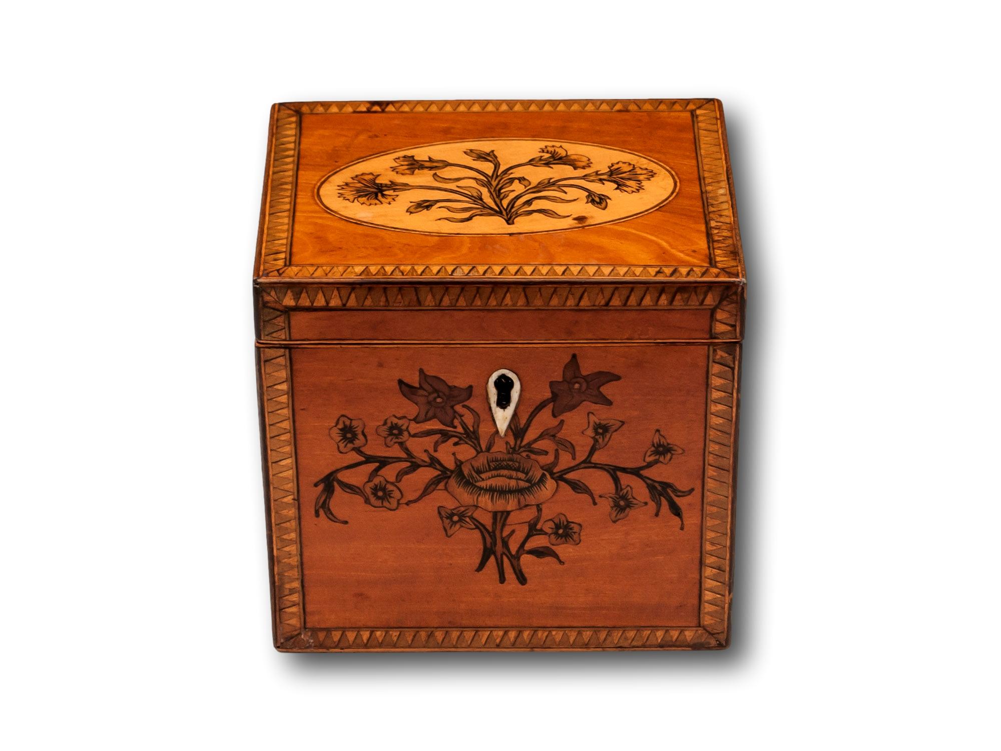 With Floral Inlays & Geometric Borders

From our Tea Caddy collection, we are delighted to offer this Satinwood Tea Caddy. The Caddy of square box form with a Satinwood exterior featuring dog tooth banding to the border of the lid and front, a