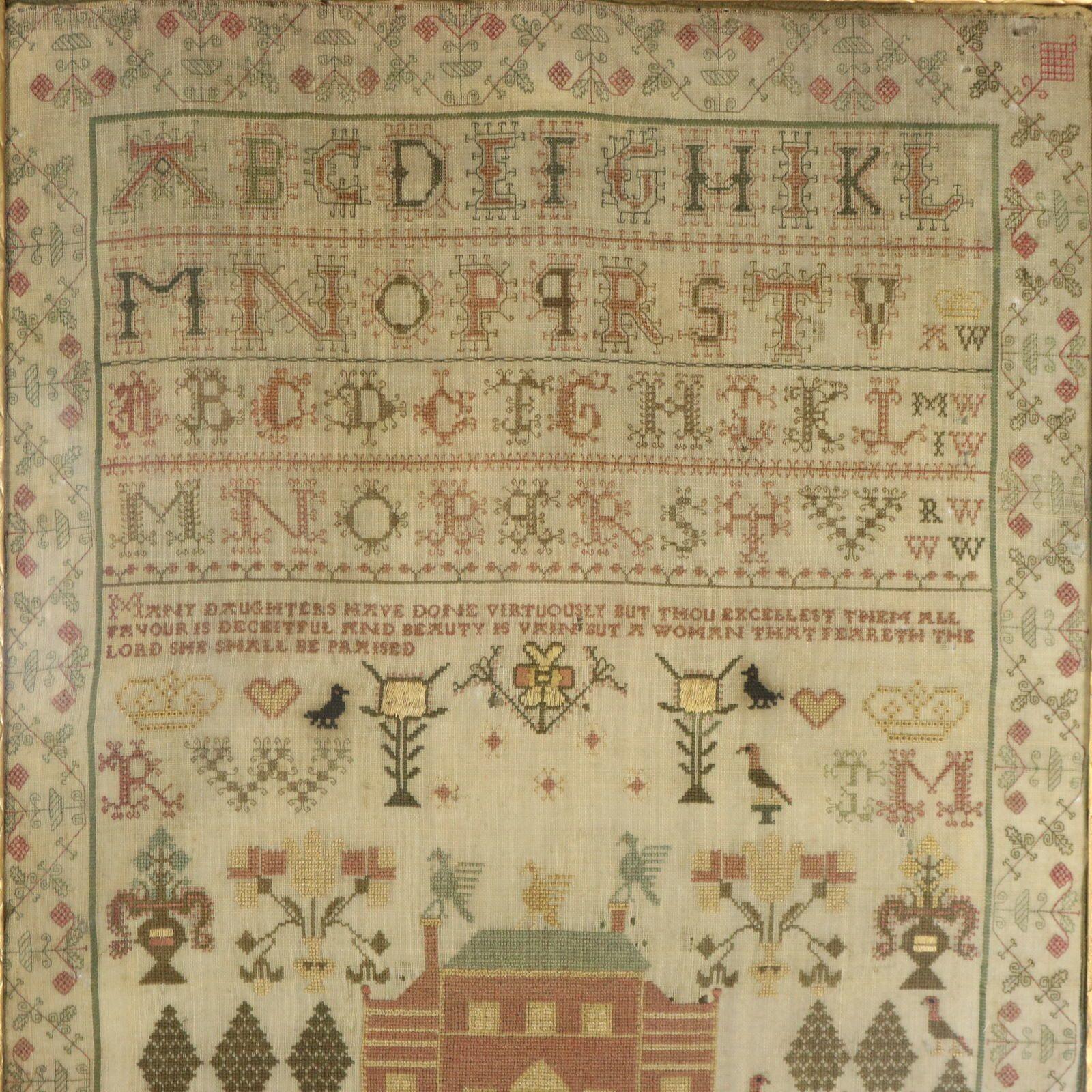 Antique Scottish Sampler, 1793, by Anne Williamson. The sampler is worked in silk threads on a linen ground, in a variety of stitches. Intricately detailed meandering strawberry border. Colours red, green, blue, gold, bronze and pink. Alphabets A-V