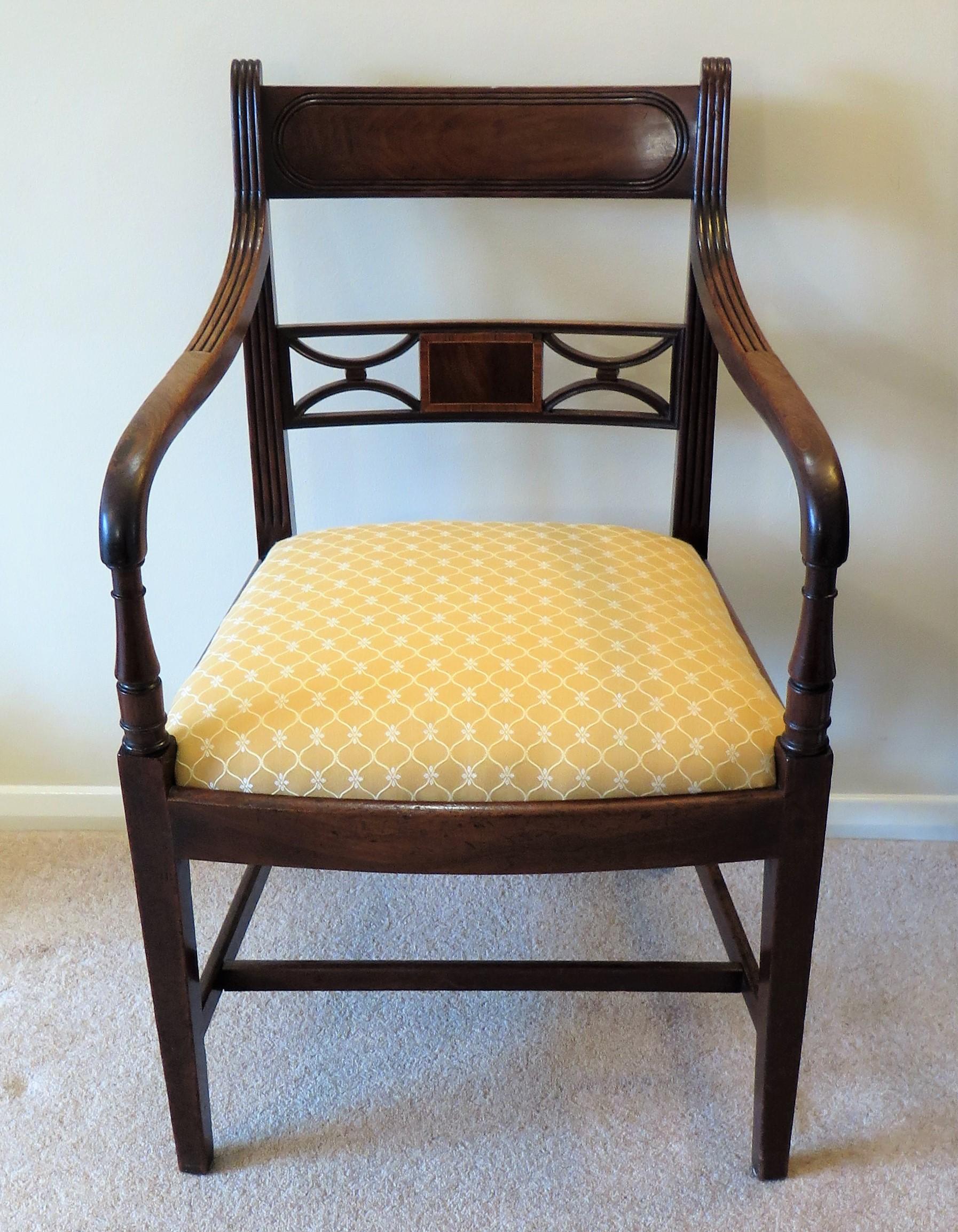 This a fine handmade English, George 111rd, Sheraton period hardwood, possibly walnut armchair with good carved detail and reupholstered drop in seat, dating to the late 18th century, circa 1790.

The whole piece is well executed with a lightness of