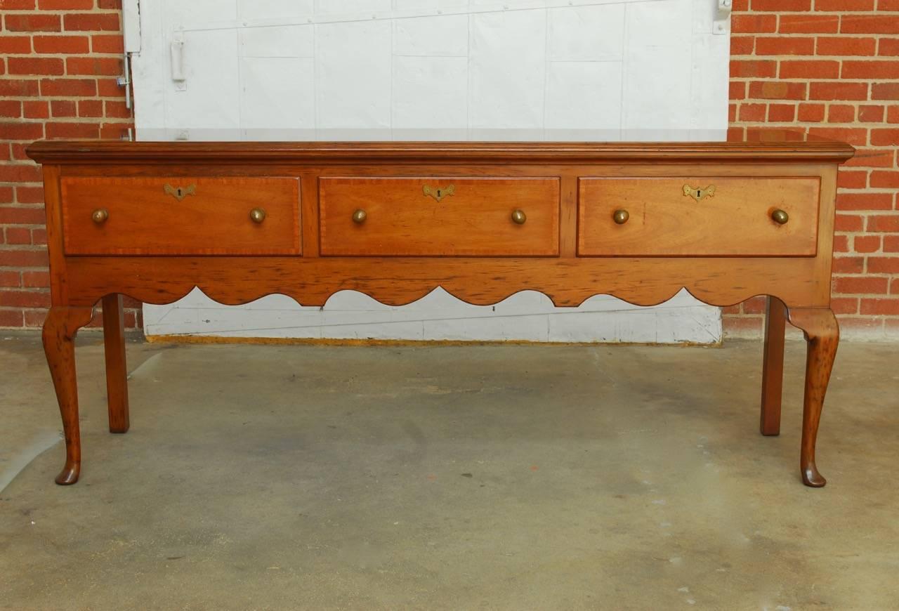 Historical Georgian style sideboard or buffet produced by Kittinger for Williamsburg Restoration Inc. The program started in 1937 to meticulously reproduce antiques to extremely high standards for an exhibit at the Craft House in Williamsburg, VA.