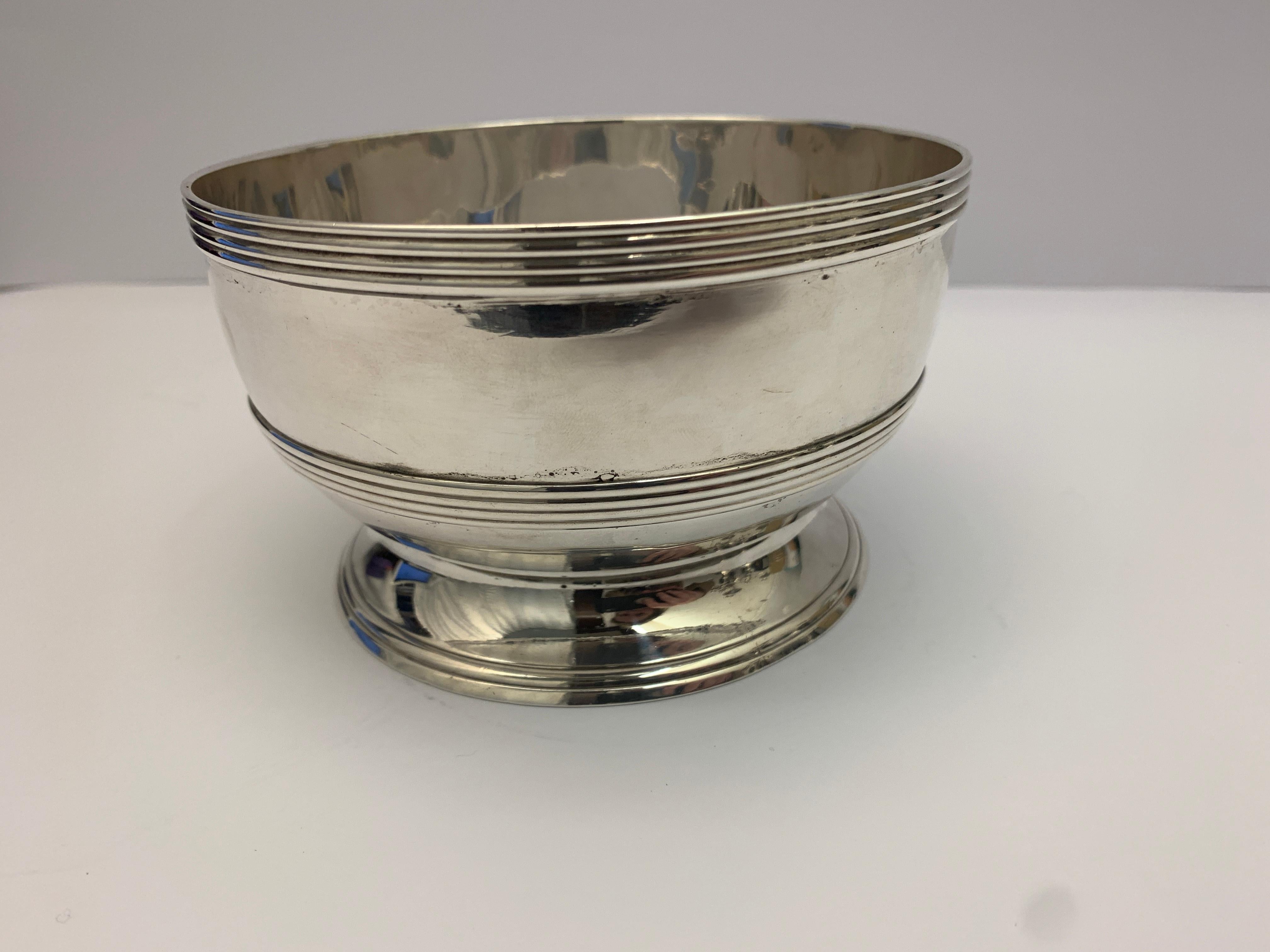 An antique silver bowl of simple design. Made in 1810 by Peter and William Bateman.