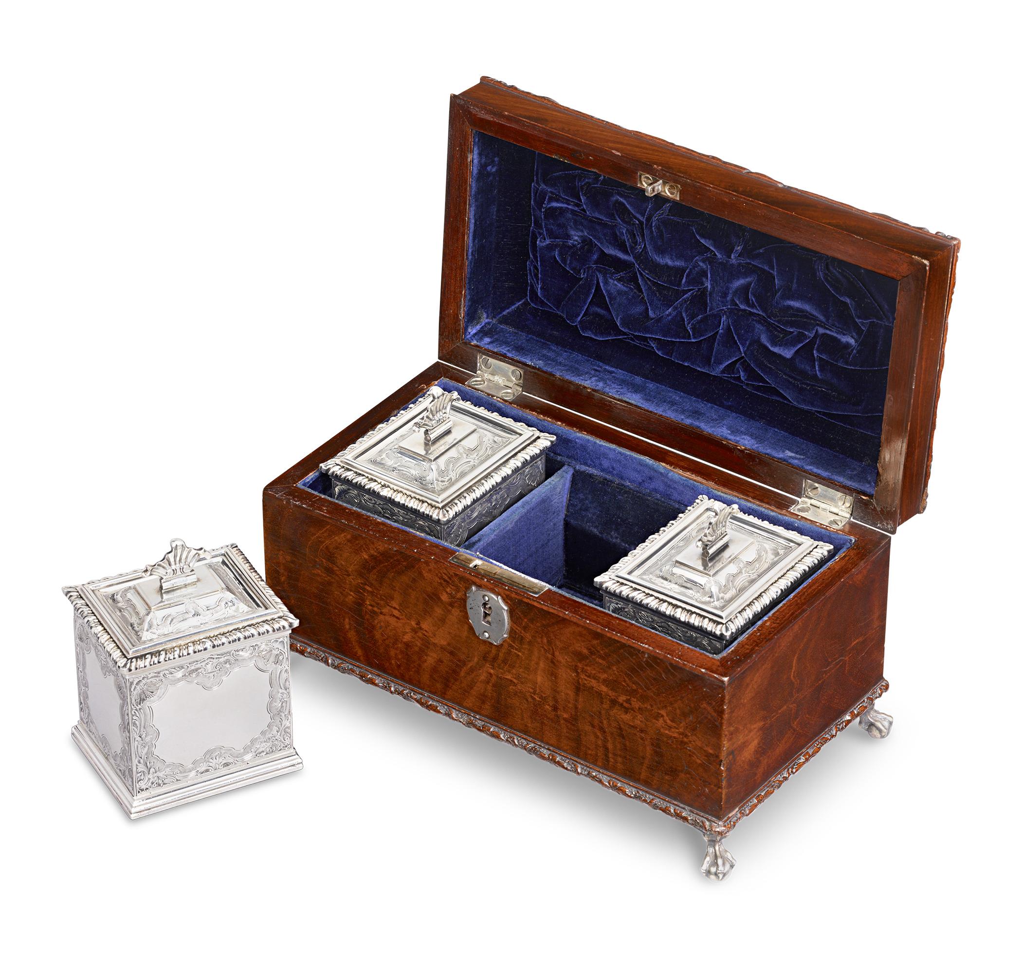 Silver Tea Caddy Set
James Shruder
Hallmarked London, 1752

This magnificent set of George II tea caddies by renowned silversmith James Shruder represents the pinnacle of 18th-century English craftsmanship. Each of the three caddies is masterfully