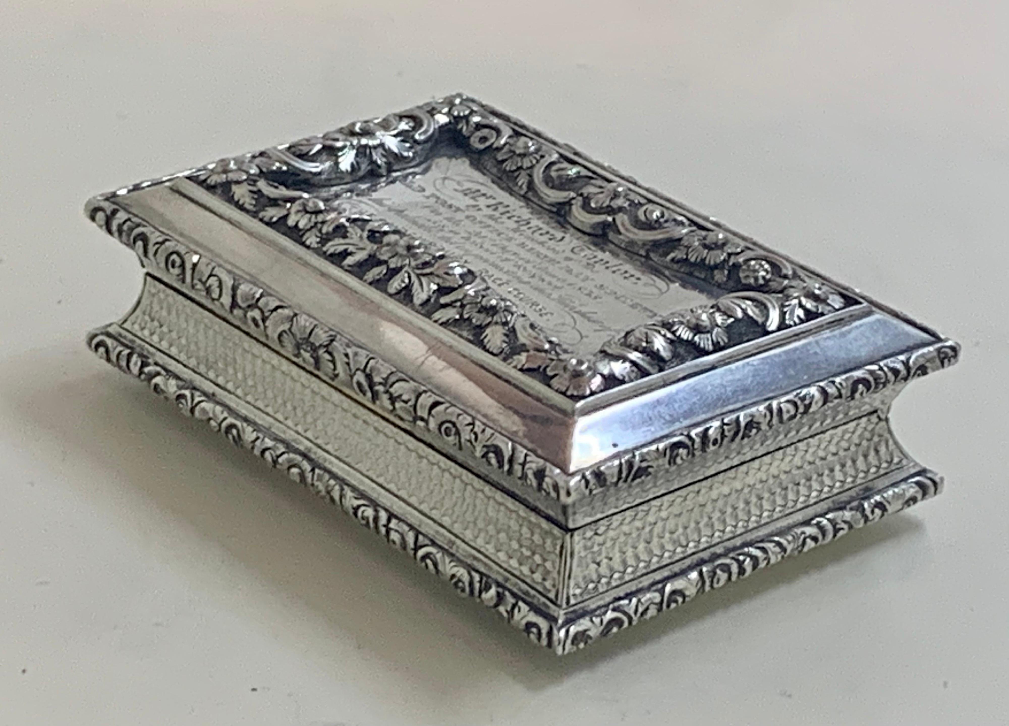 This superb quality Georgian silver table snuff box was made in Birmingham in 1836 by W.S and measures 3 1/2 inches in length by 2.35 inches wide and is 1 1/8 inches tall. It has beautifully cast decoration of flowers, foliage and scrolling acanthus