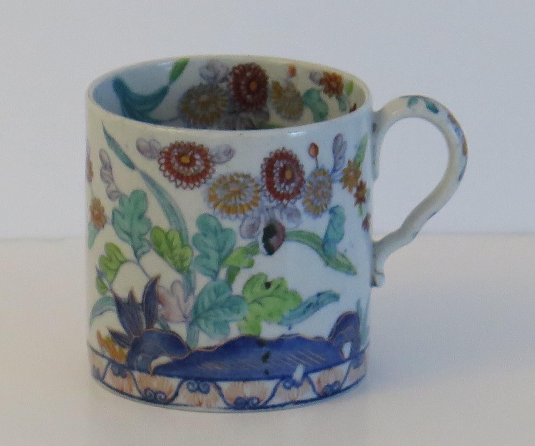 This is a good stone China (Ironstone) coffee can made by the SPODE factory in the early 19th Century, circa 1820.

The coffee can is well potted with cylindrical shape and a loop handle with the distinctive Spode kink to it. The piece is